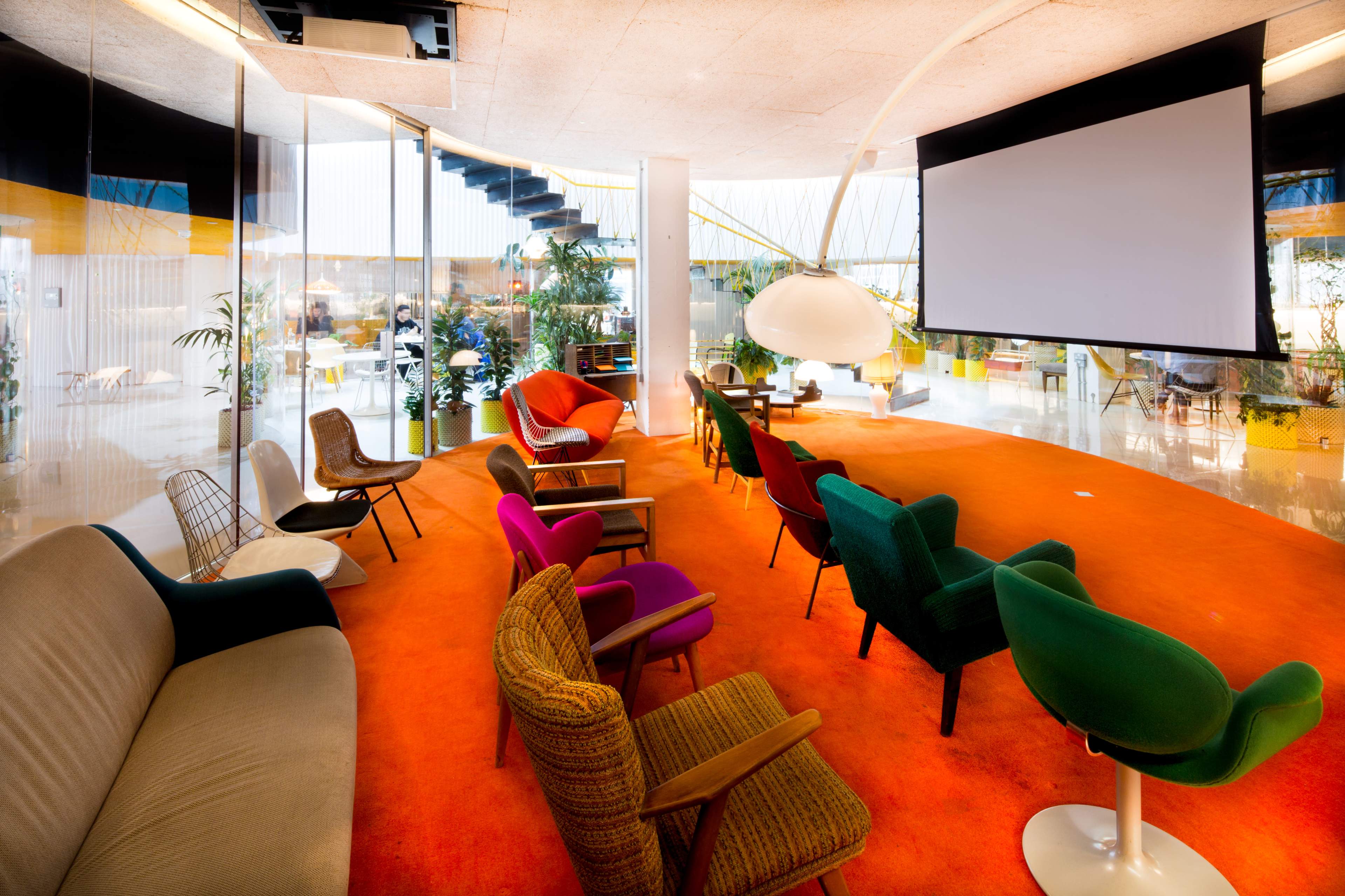 Flexible London event space, vibrant orange, product launch, brainstorm.
