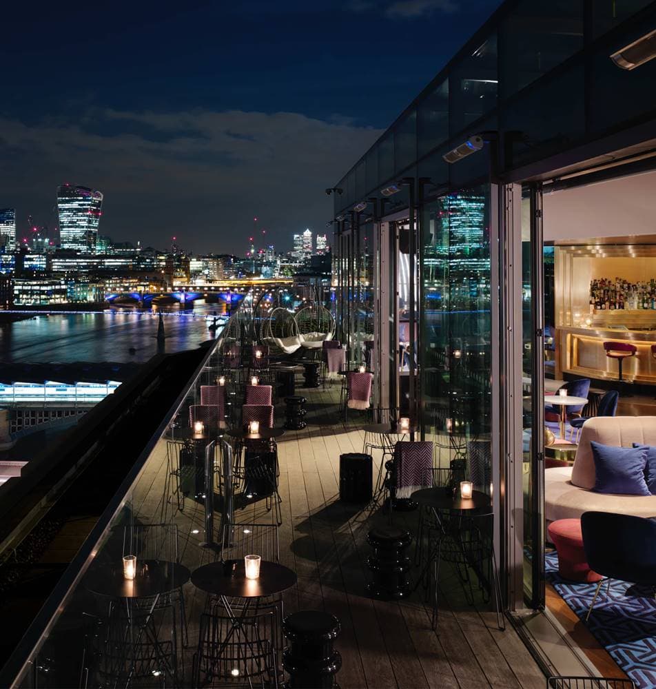 Rooftop bar city views corporate event launch