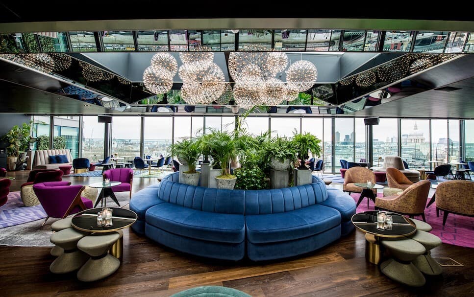 12th Knot rooftop bar with blue velvet banquette for premium networking events and receptions.