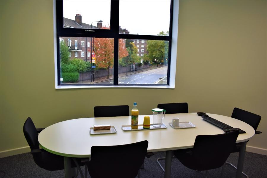 Camden boardroom meeting, oval table, natural light