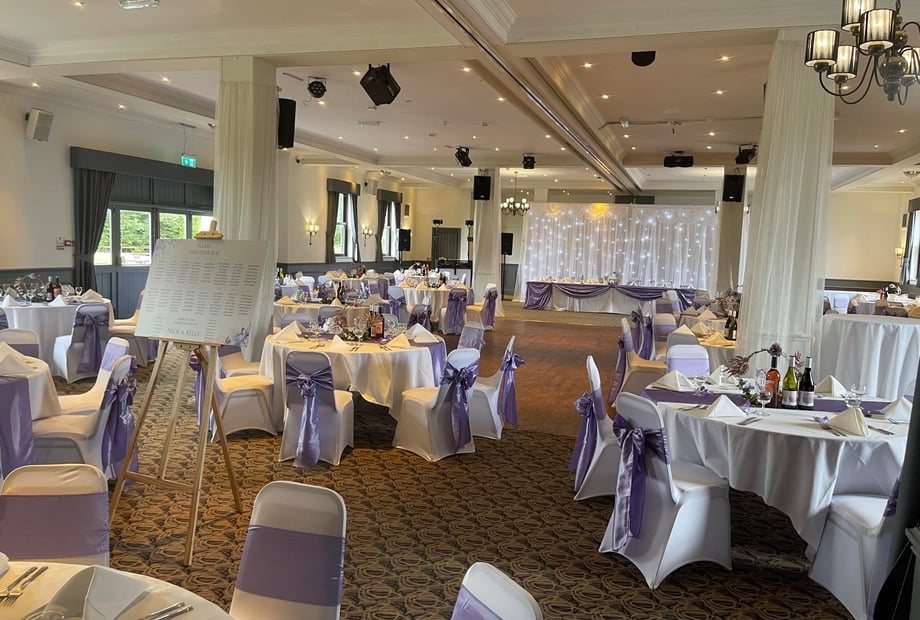 Lincoln Room wedding reception, purple sashes