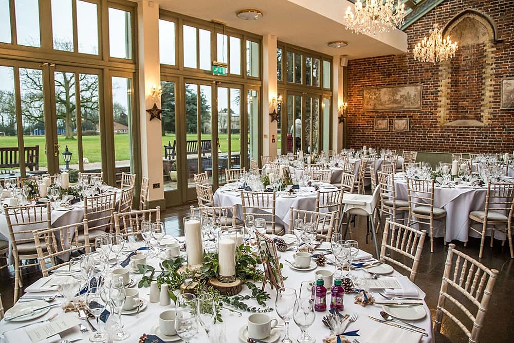 Glasshouse wedding gala venue, rustic chic decor, chandeliers