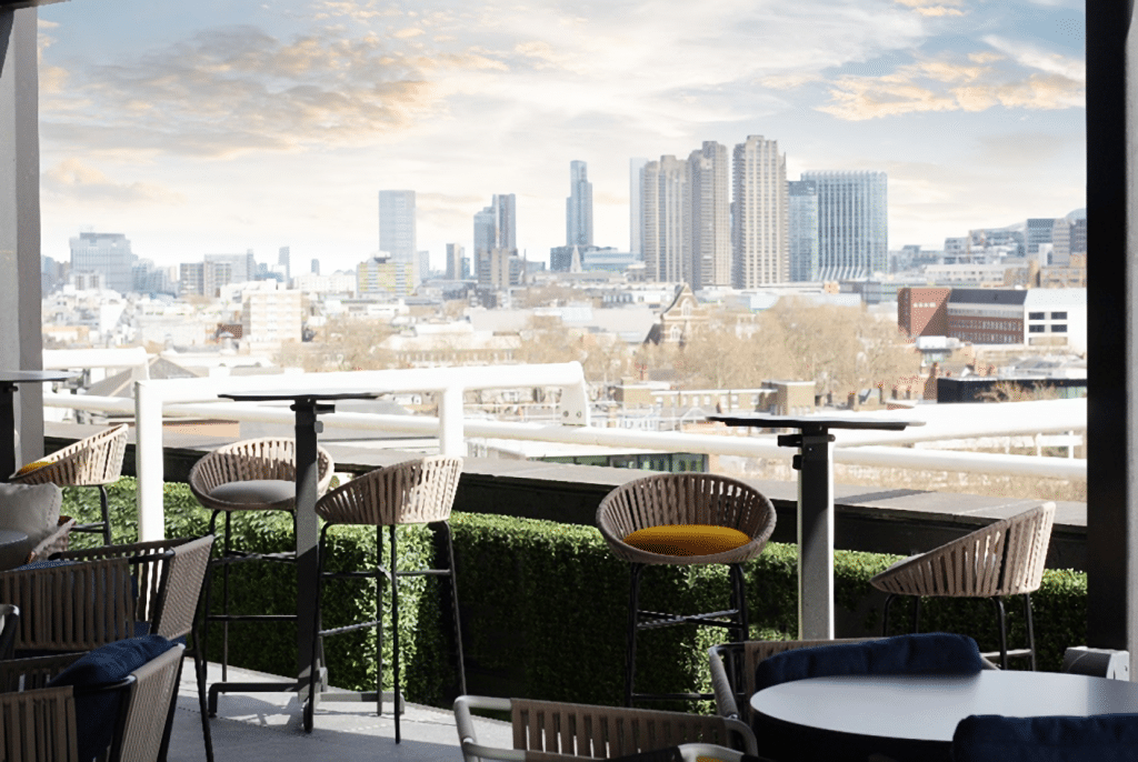 Rooftop bar event, city views, VIP reception