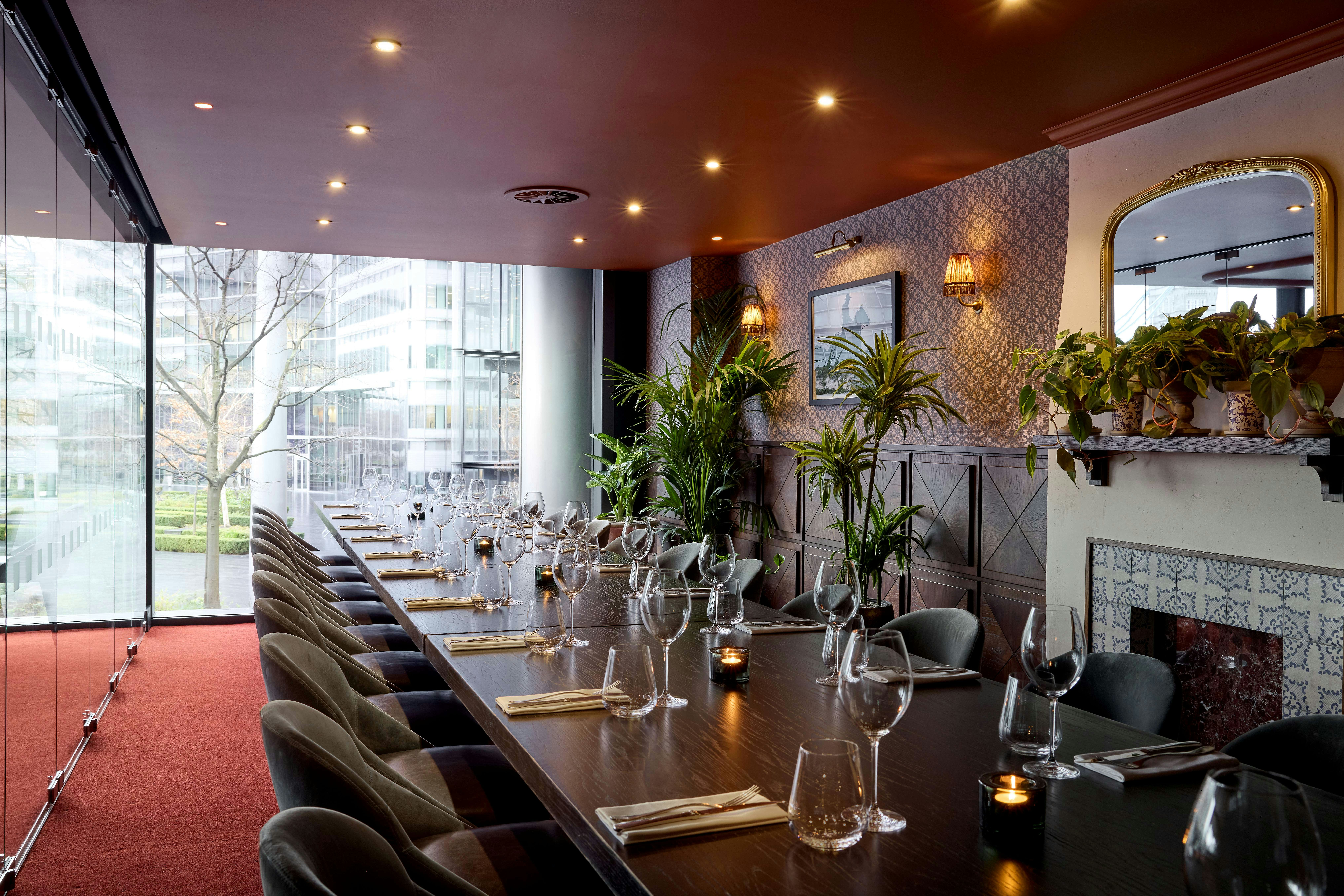 Glasshouse private dining, fireplace, corporate event, board meeting