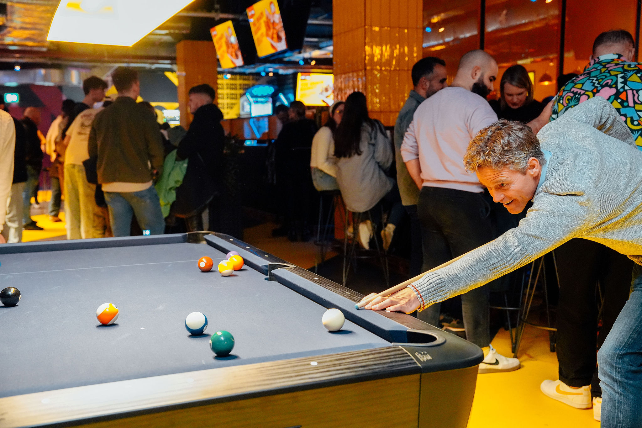 Corporate mixer venue hire in Edinburgh featuring high-energy lounge and interactive entertainment.