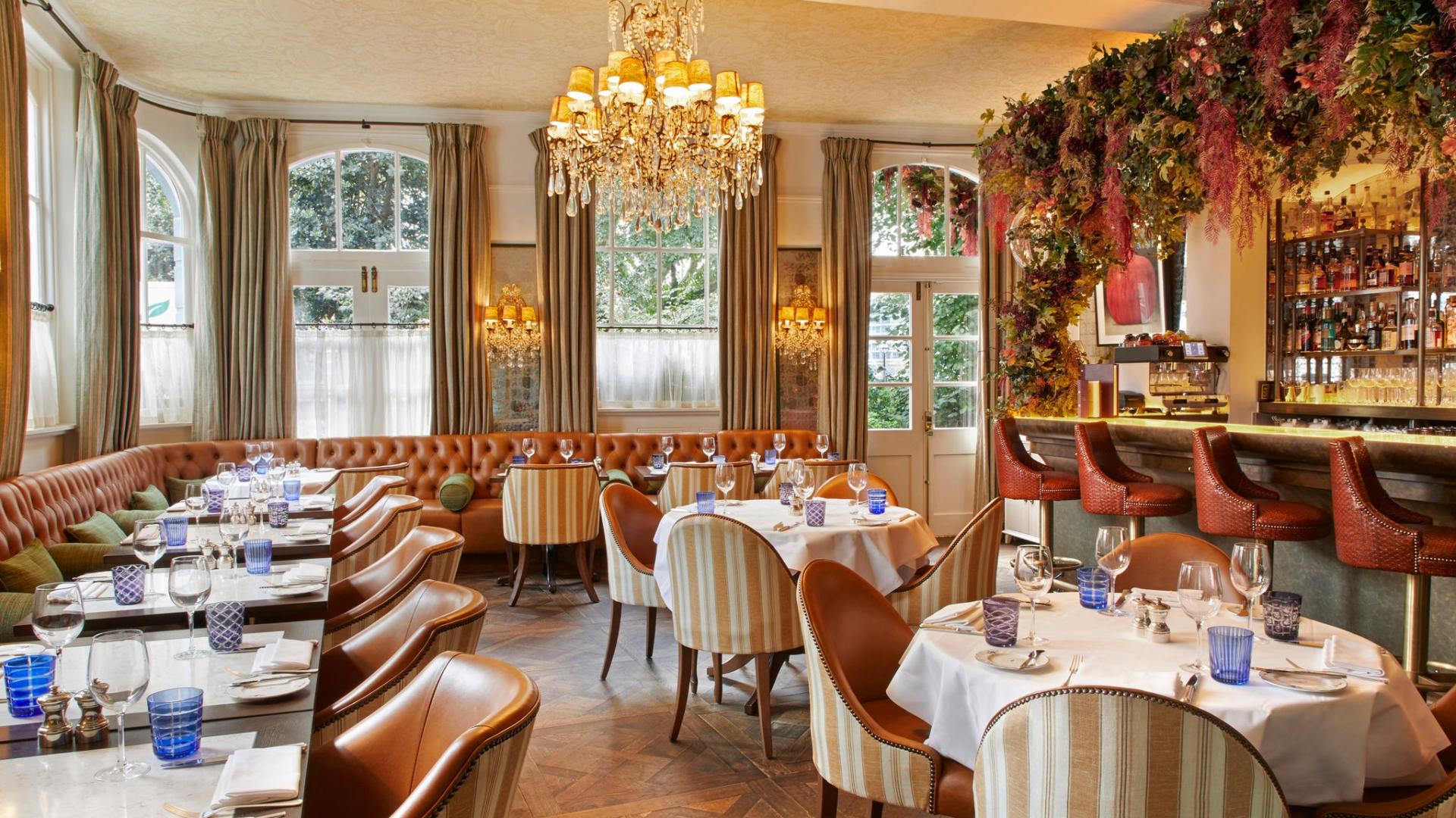 Elegant Rex Rooms event venue, chandeliers, floral decor, reception space