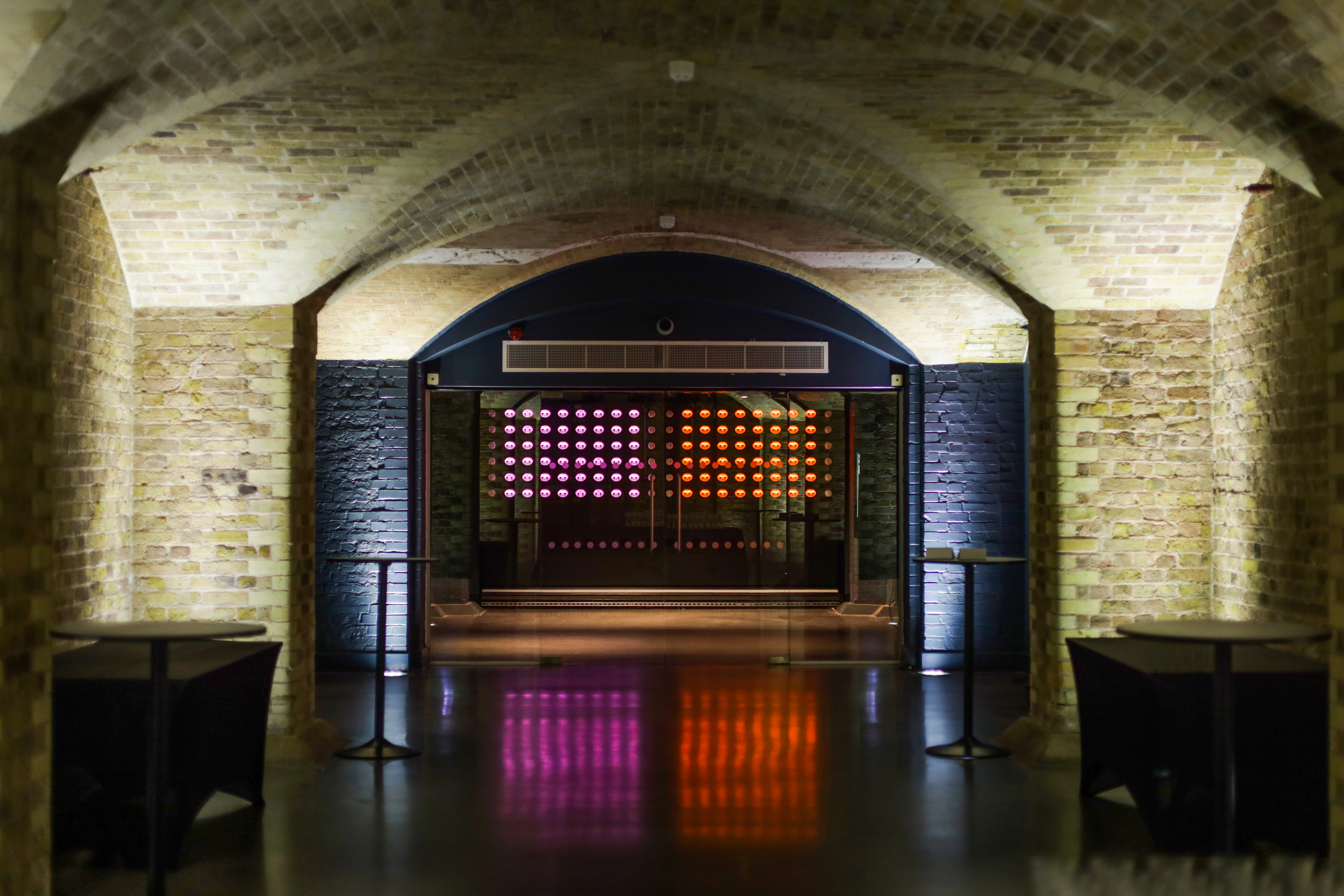 SPYSCAPE event venue, brick archway, cocktail reception, product launch