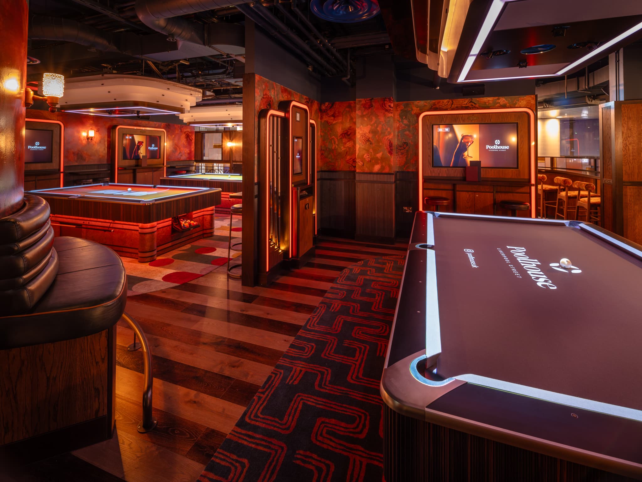 Starlight Suite at Poolhouse: Premium venue with pool tables for corporate events and mixers.