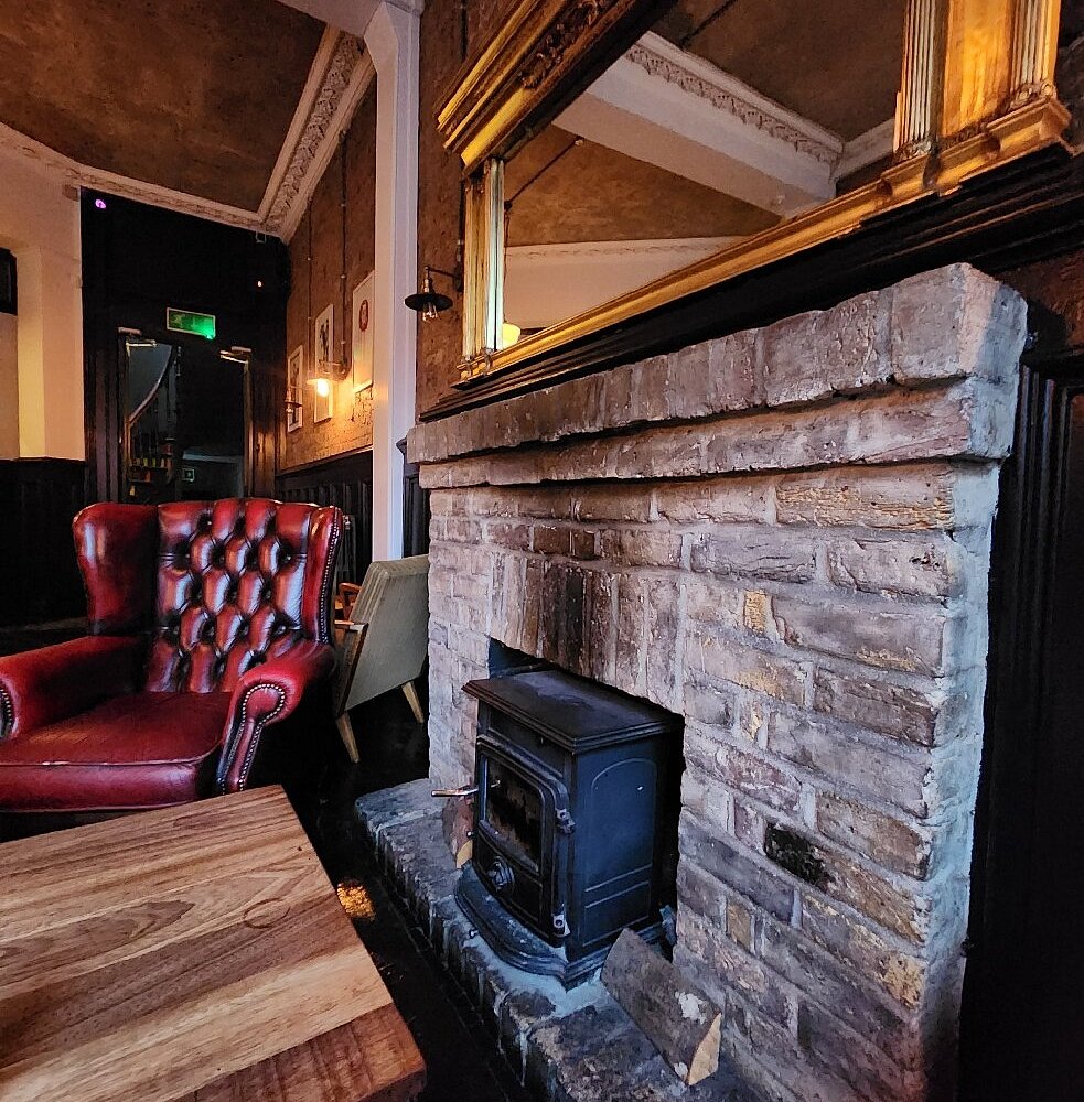 Castle basement event space, brick fireplace, networking, meeting