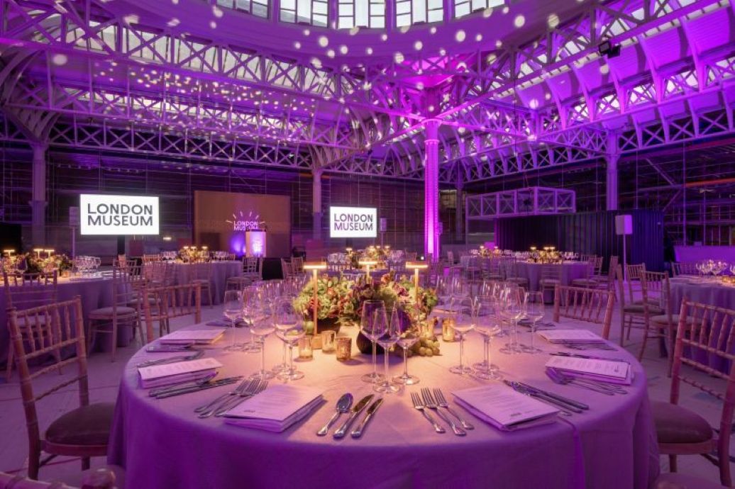 Gala dinner London Museum, purple lighting, corporate event