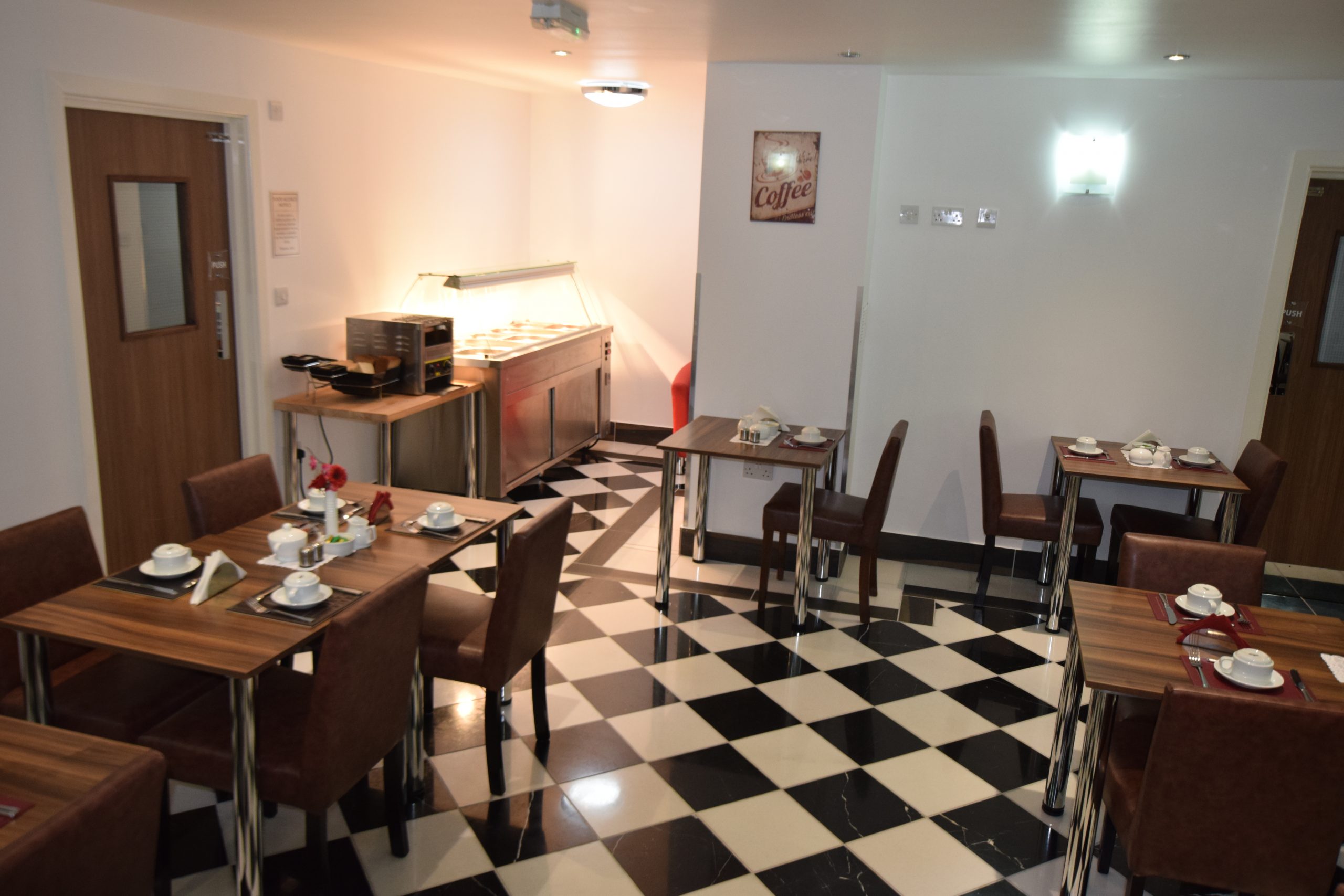 Lucky 8 Hotel dining, checkered floor, event space, buffet