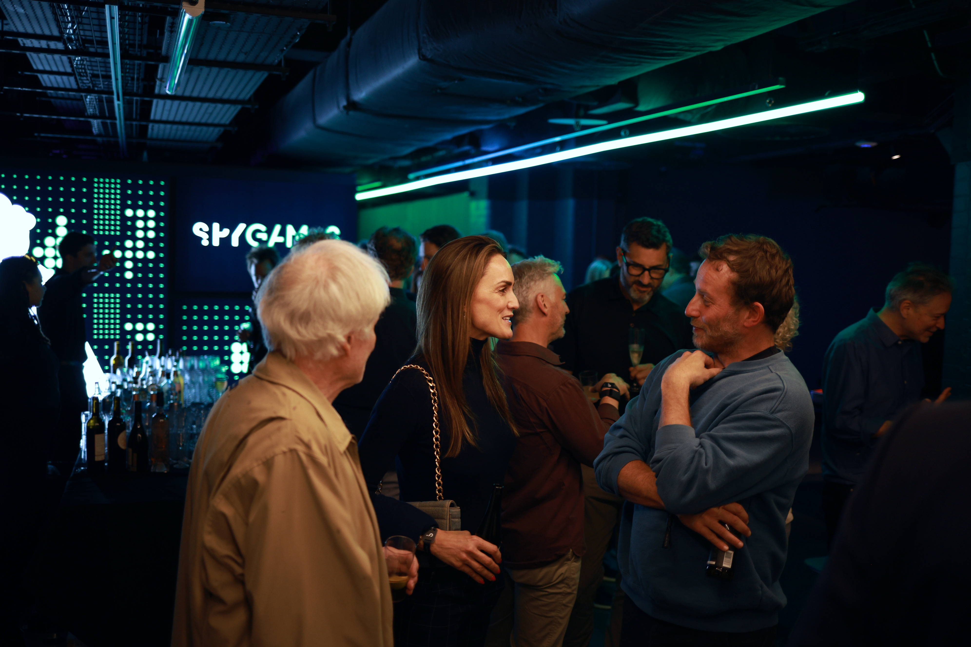 SPYGAMES Arena networking event, modern, corporate