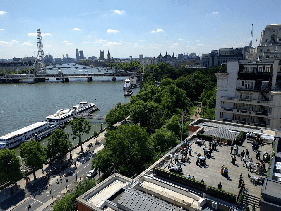 Savoy Place rooftop event, London skyline, corporate reception, VIP.