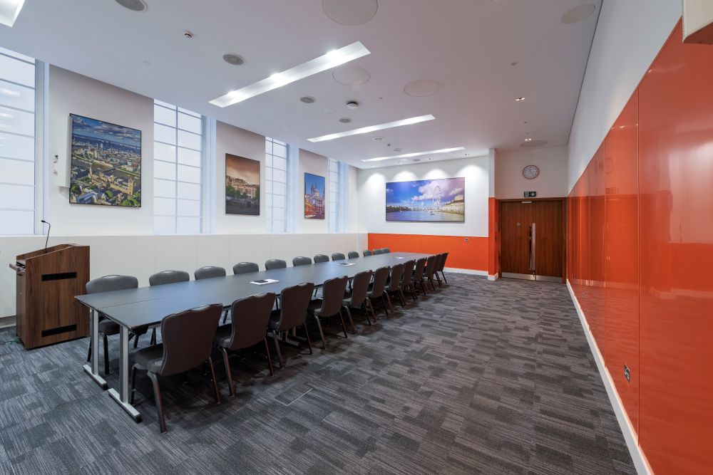 Savoy Place boardroom, orange wall, corporate event, meeting venue