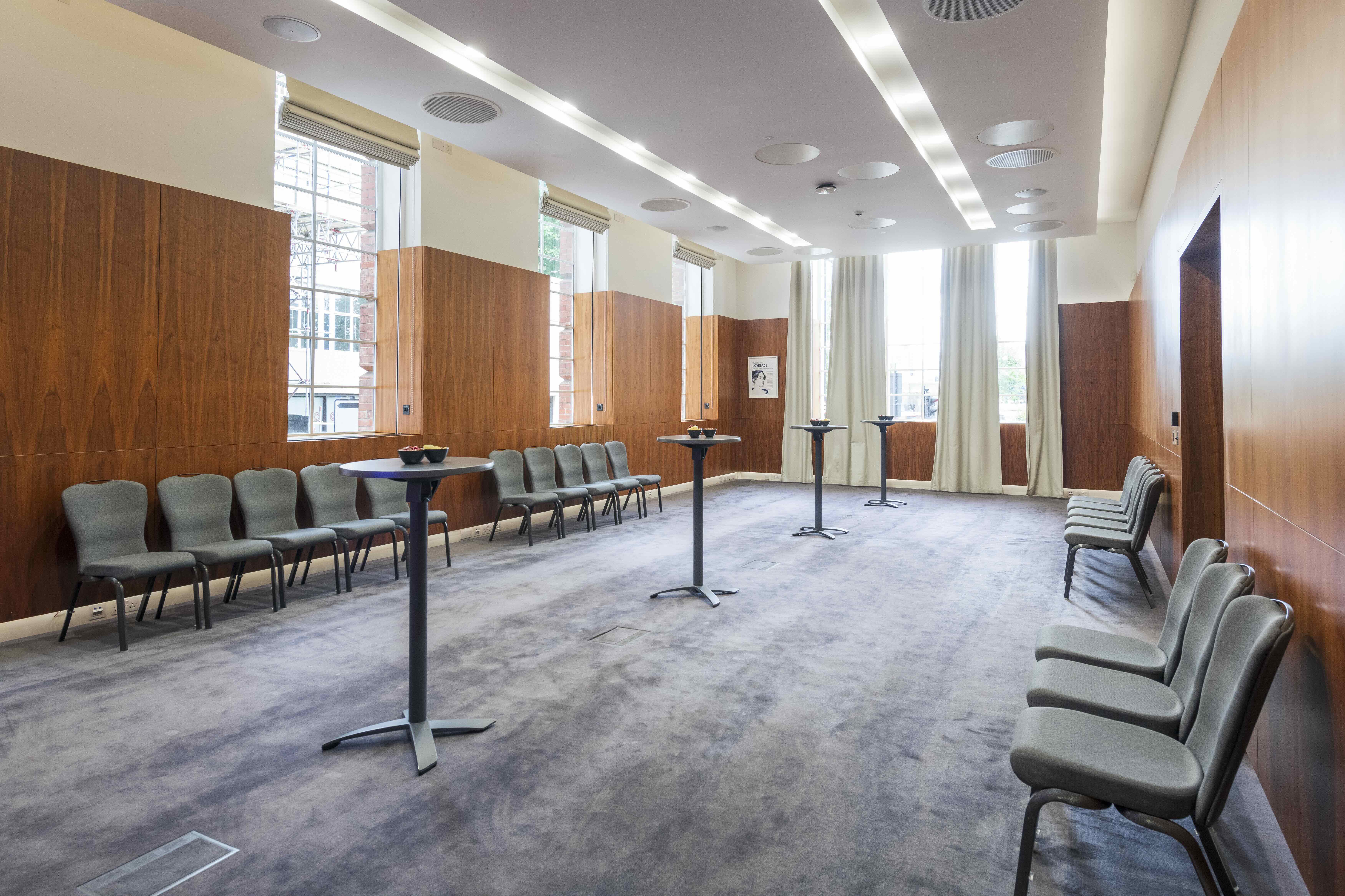 Lovelace Room London event space, wood paneling, breakout session