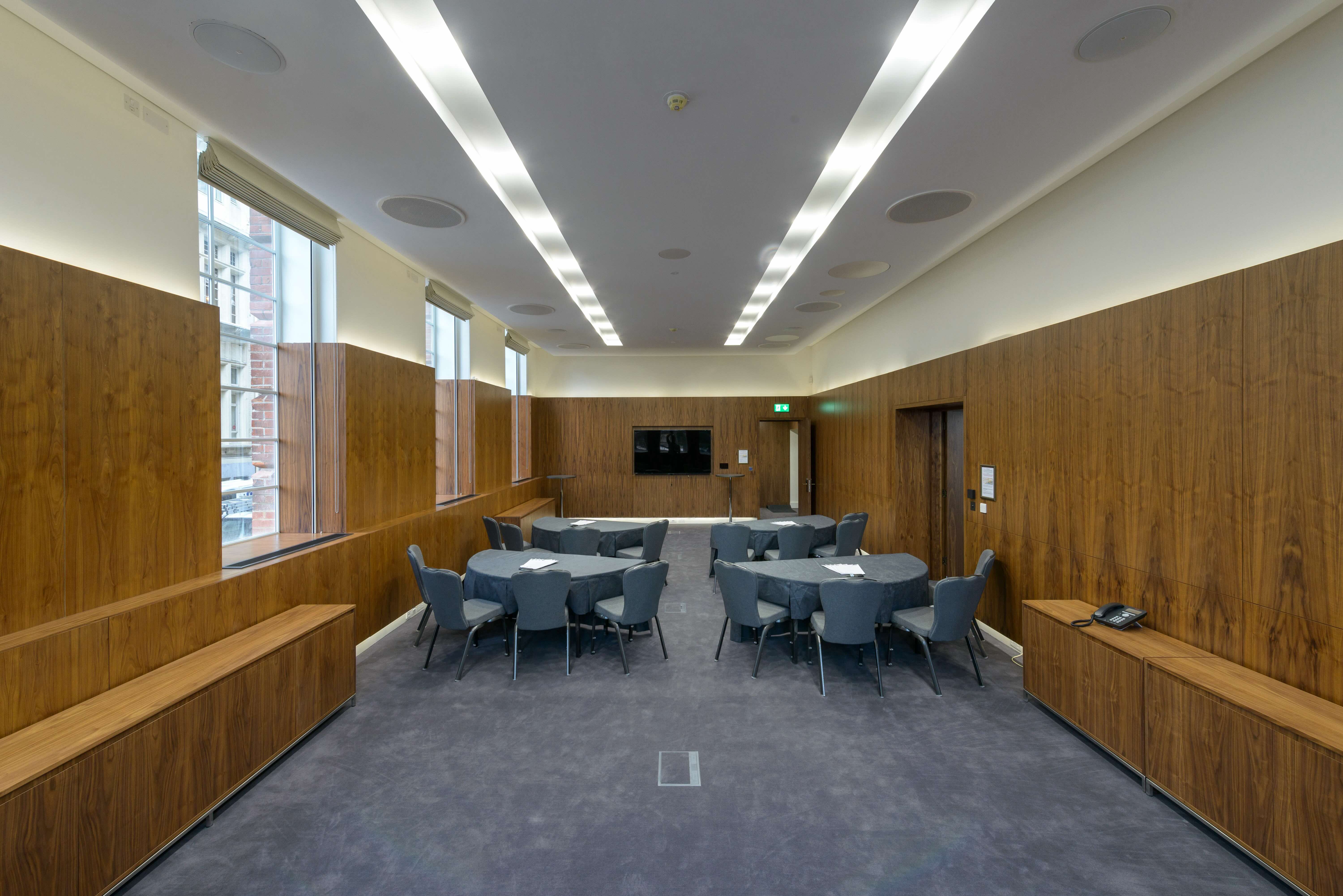 Marconi Room event, circular tables, modern venue, London meeting