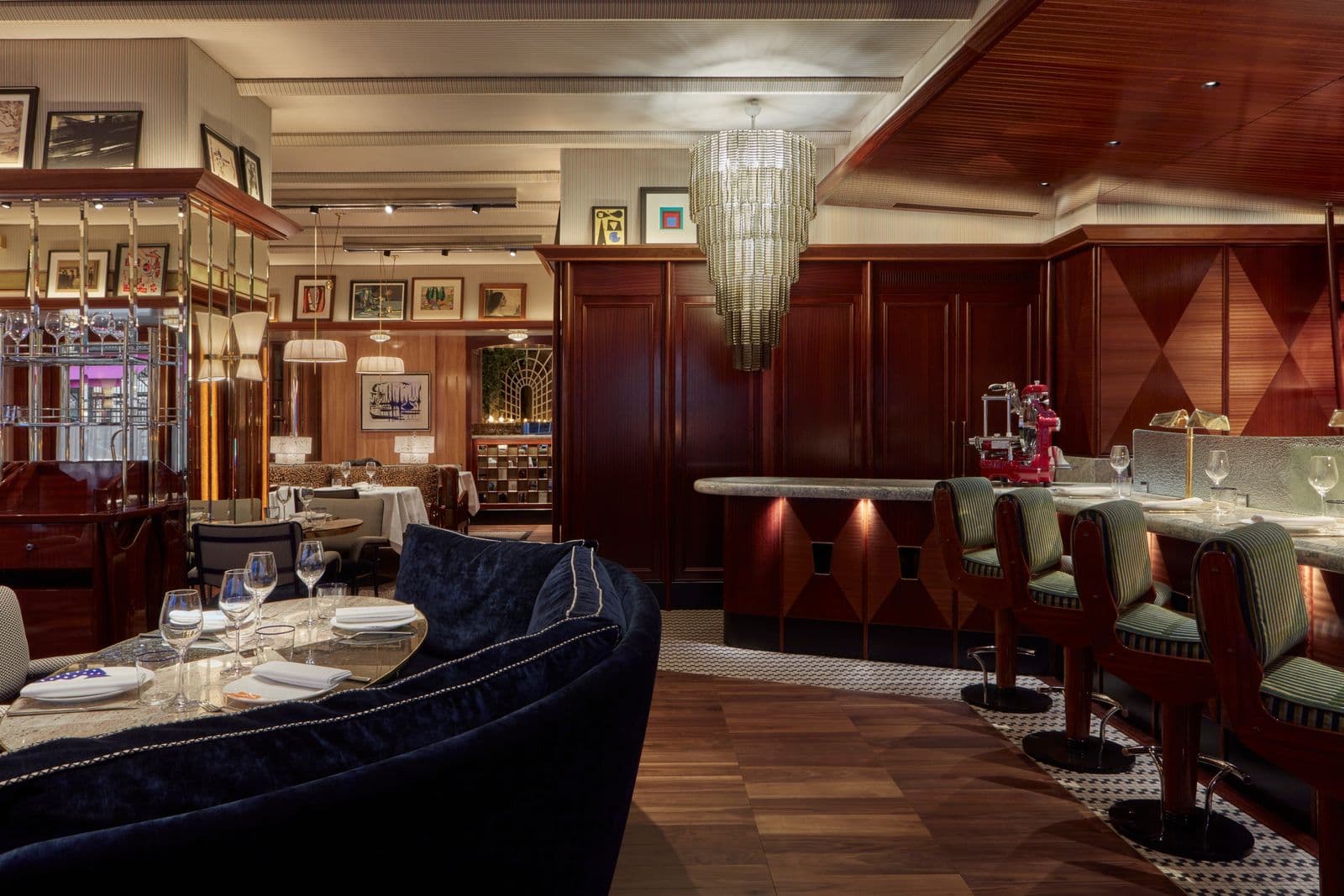 Upscale Il Gattopardo dining lounge with booth seating for corporate dinners and networking.
