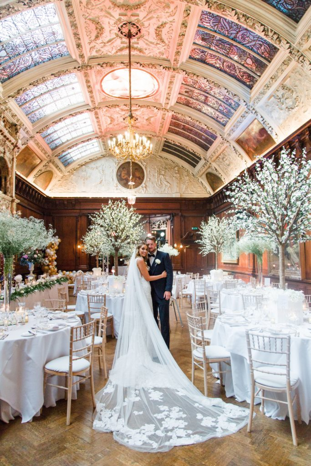 Thornton Manor wedding reception in heritage ballroom with blossom tree centerpieces.