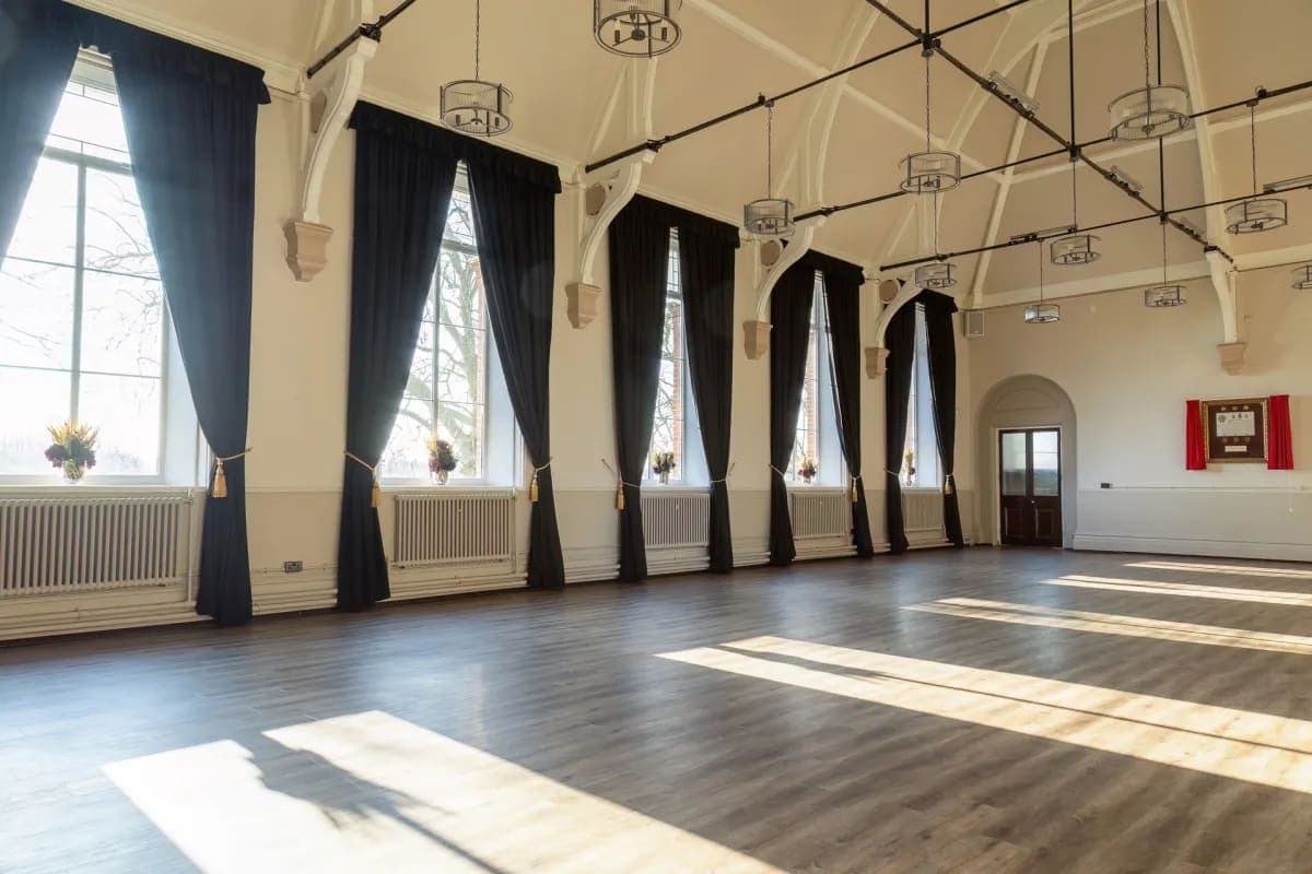 Whitford Hall: Versatile event venue with vaulted ceilings for weddings and corporate banquets.