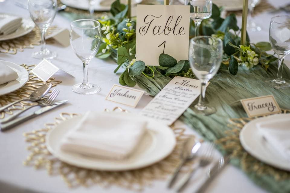 Elegant Whitford Hall table setting with gold accents for weddings and social events.