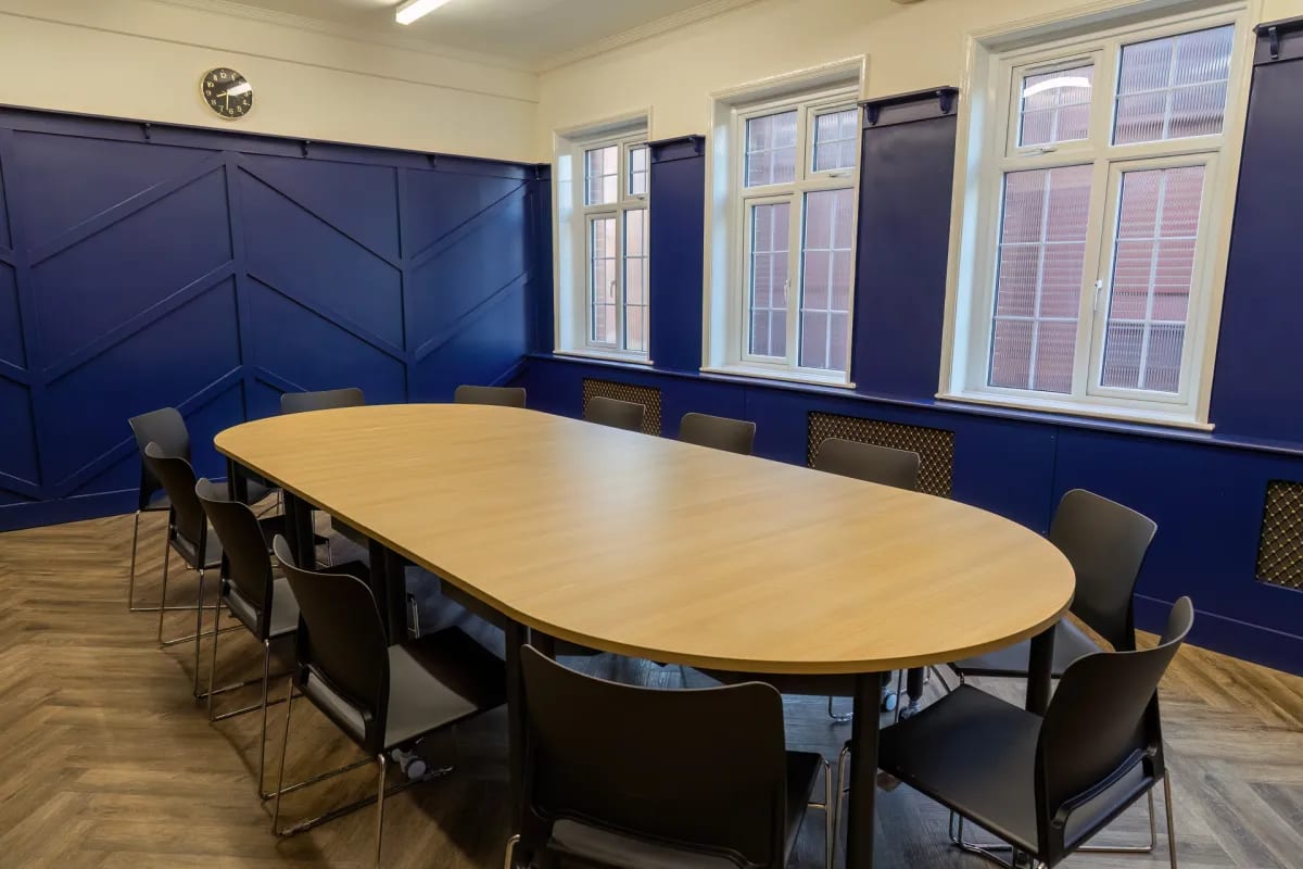Wandle Suite at Vestry Hall: Oval boardroom setup for professional meetings and corporate events.