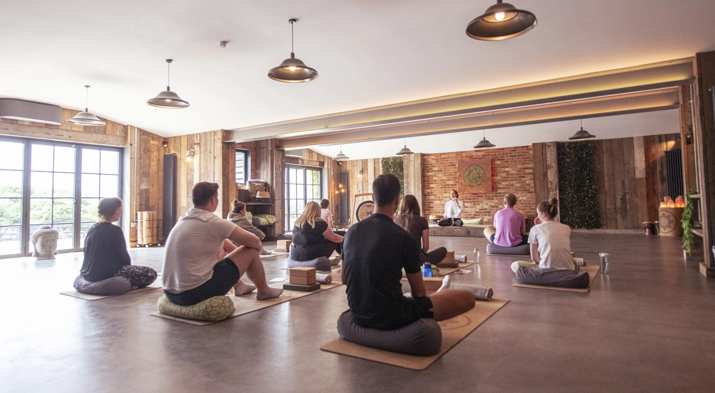 Main Barn wellness breakout space with natural light for corporate retreats and team building.