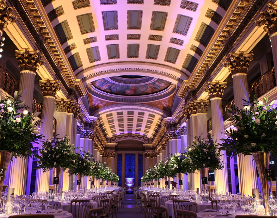 Neoclassical ballroom at The Signet Library with floral centerpieces for gala and corporate events.