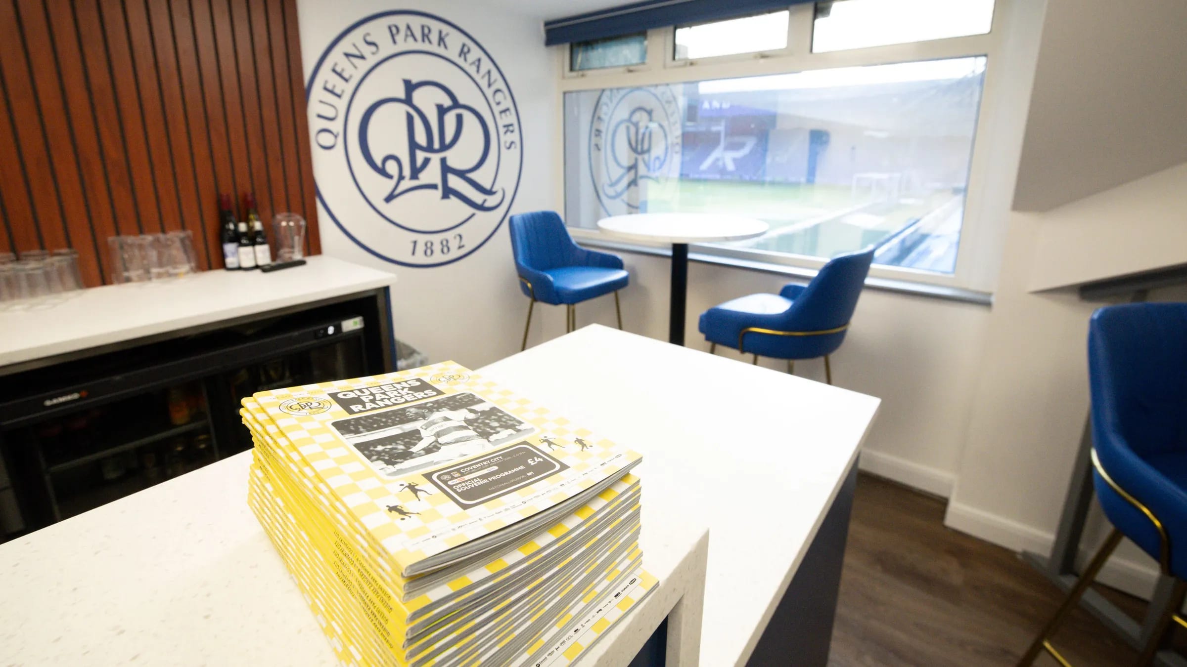 Capital Lounge at Loftus Road Stadium: luxury corporate hospitality suite for executive meetings.