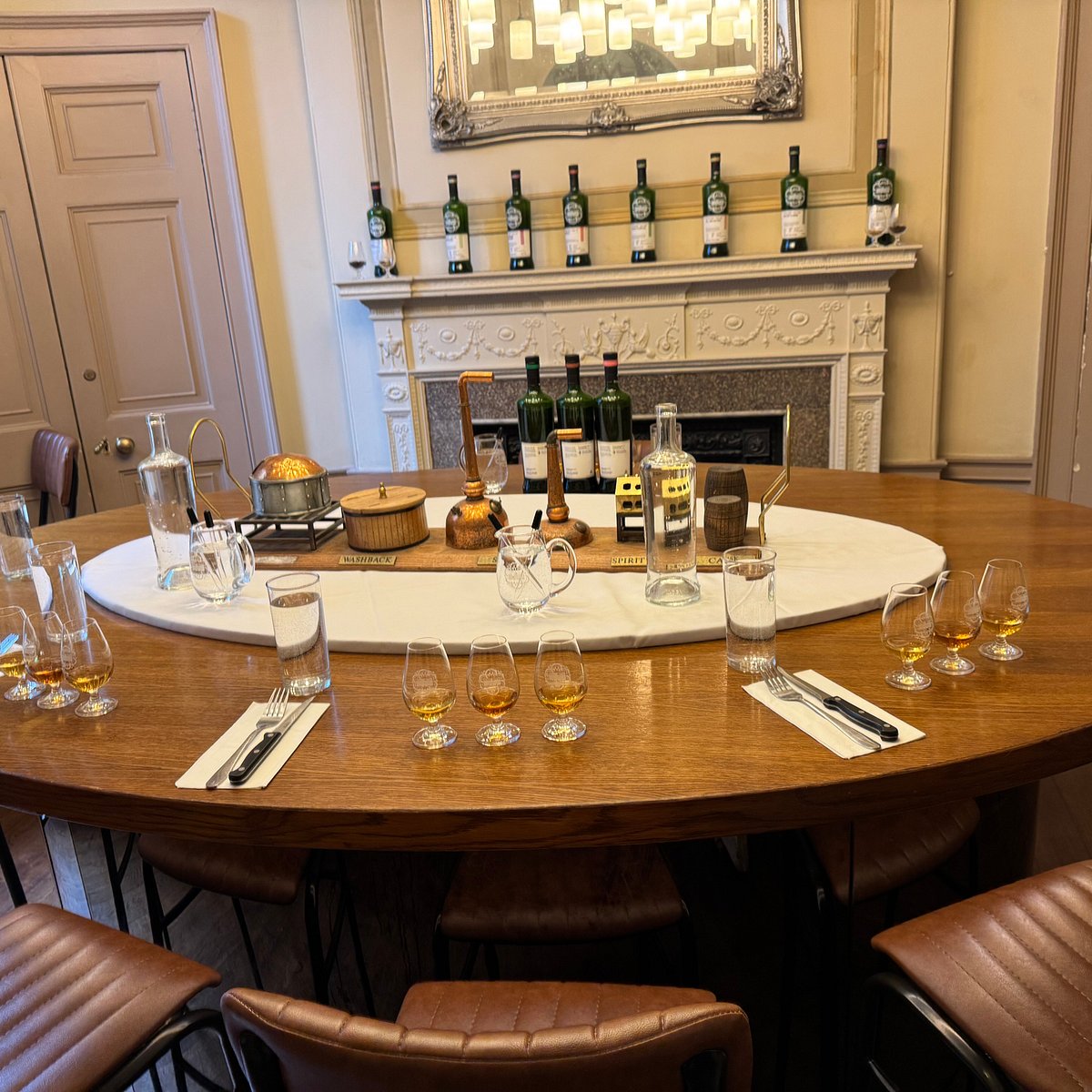 Whisky tasting at The Spirit Safe Room, featuring an intimate tabletop for corporate events.