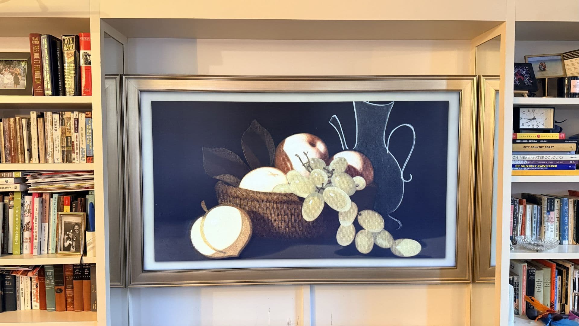 Executive boardroom with integrated digital art display for professional corporate events.