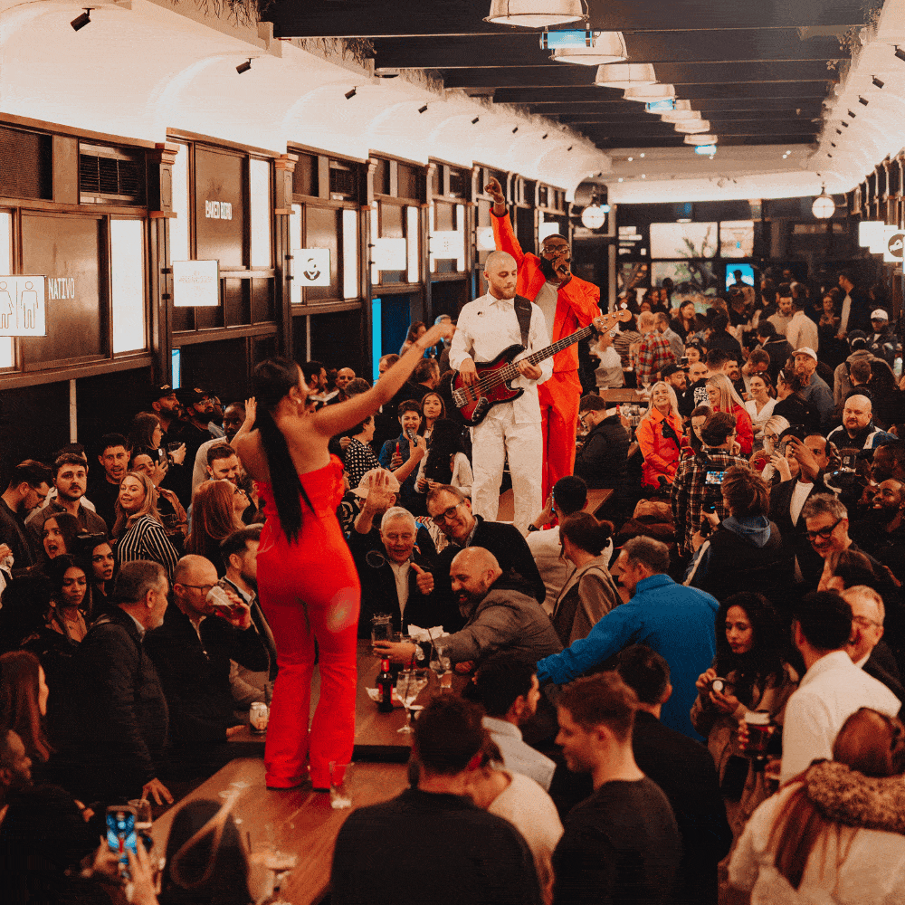 The Snug at BOXHALL City featuring a live performer in a high-impact, compact event space.