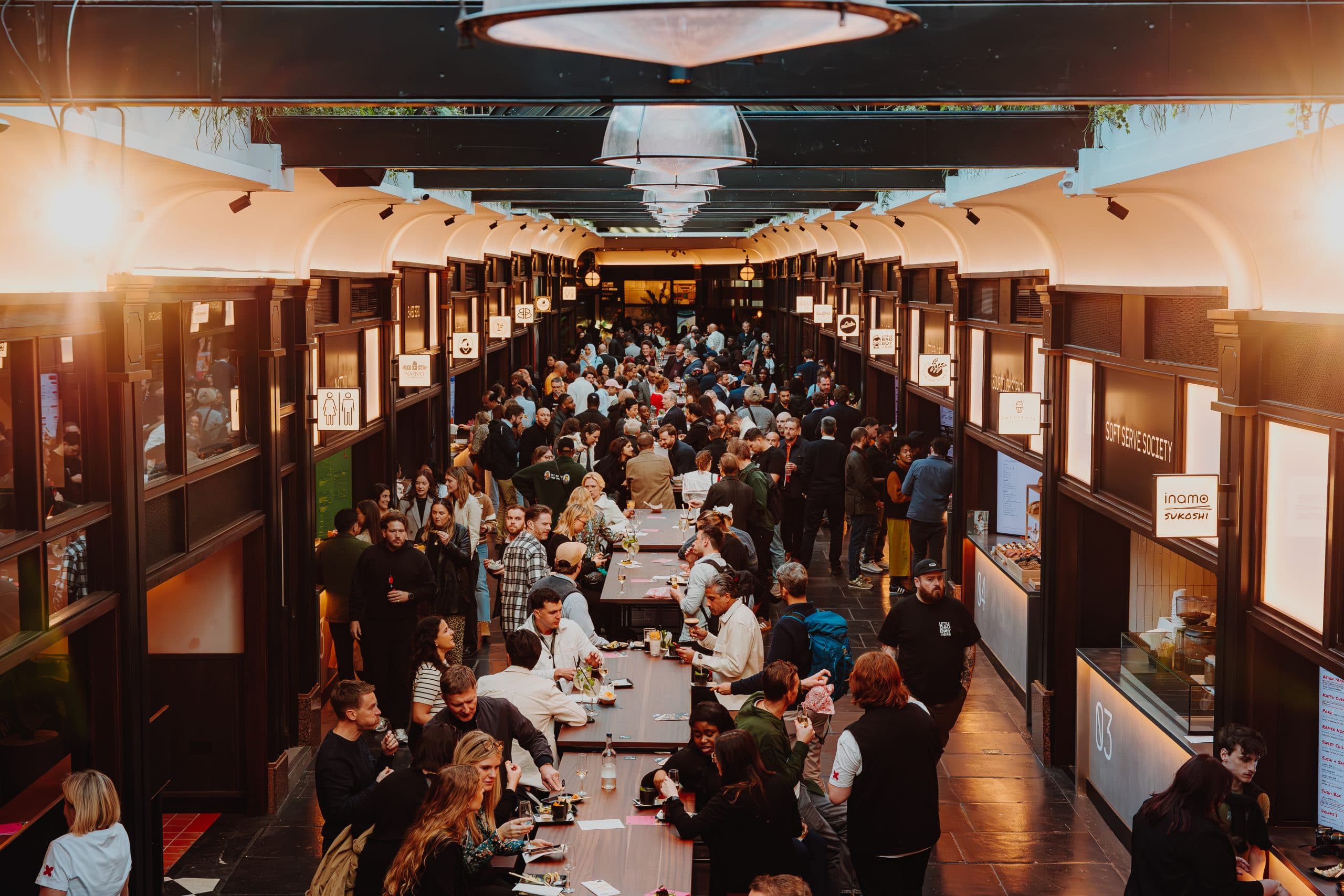 BOXHALL City Ticket Hall: Networking venue with communal tables for corporate mixers and events.