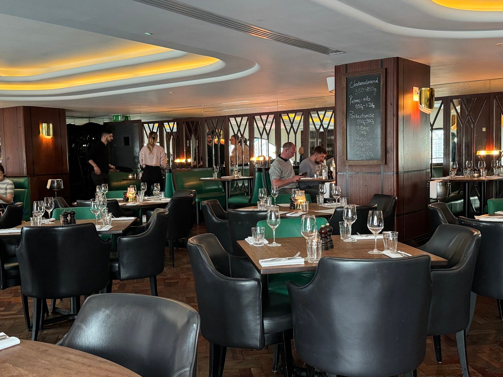 Hawksmoor Air Street bar area with booth seating for corporate dinners and networking events.