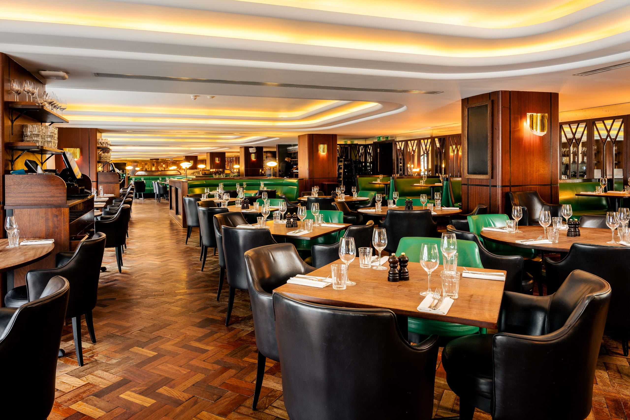 Sophisticated Hawksmoor Air Street bar with wood accents for corporate dinners and networking events.