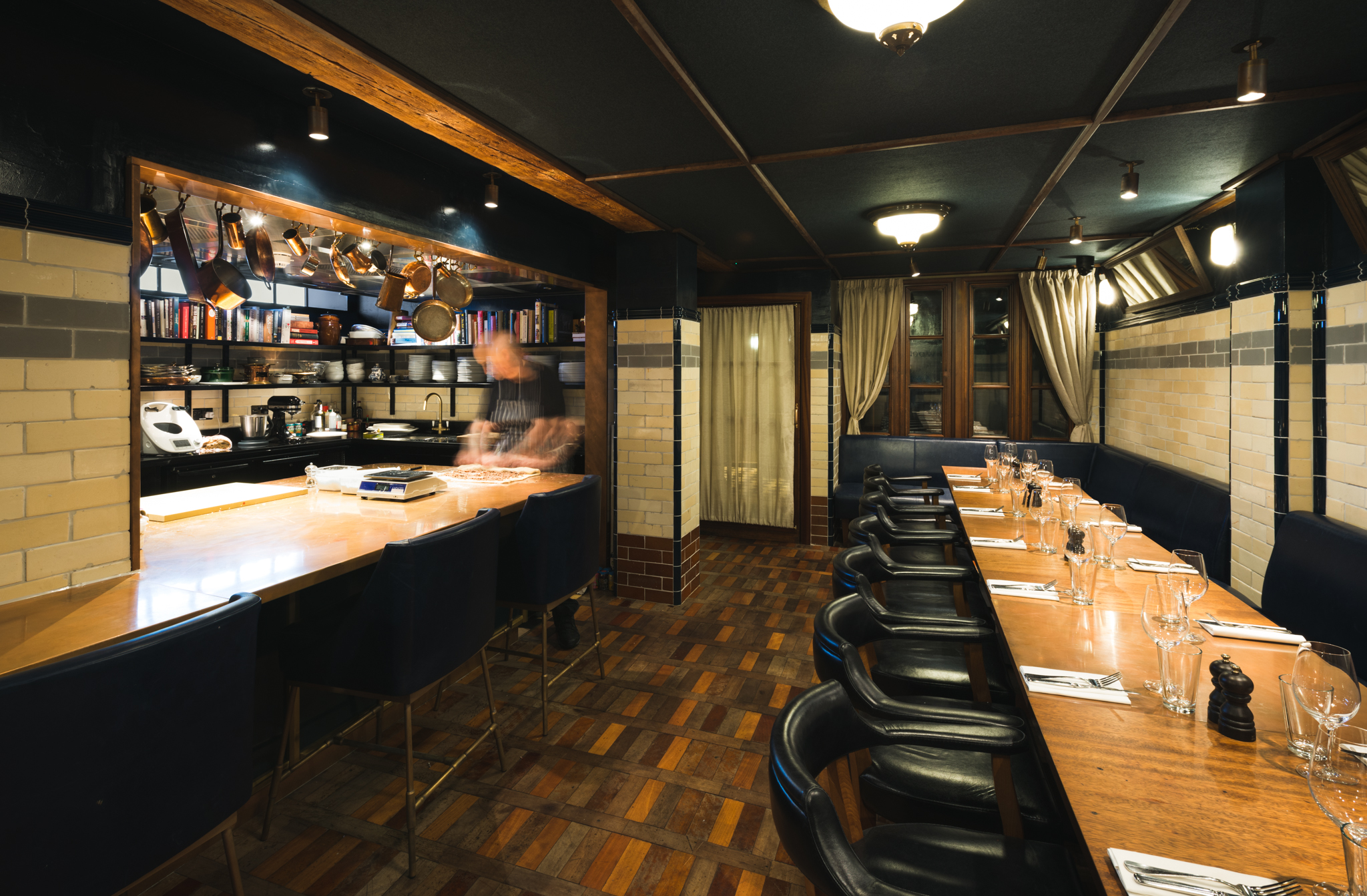 Intimate private dining room at Hawksmoor Borough for executive board dinners and culinary workshops.