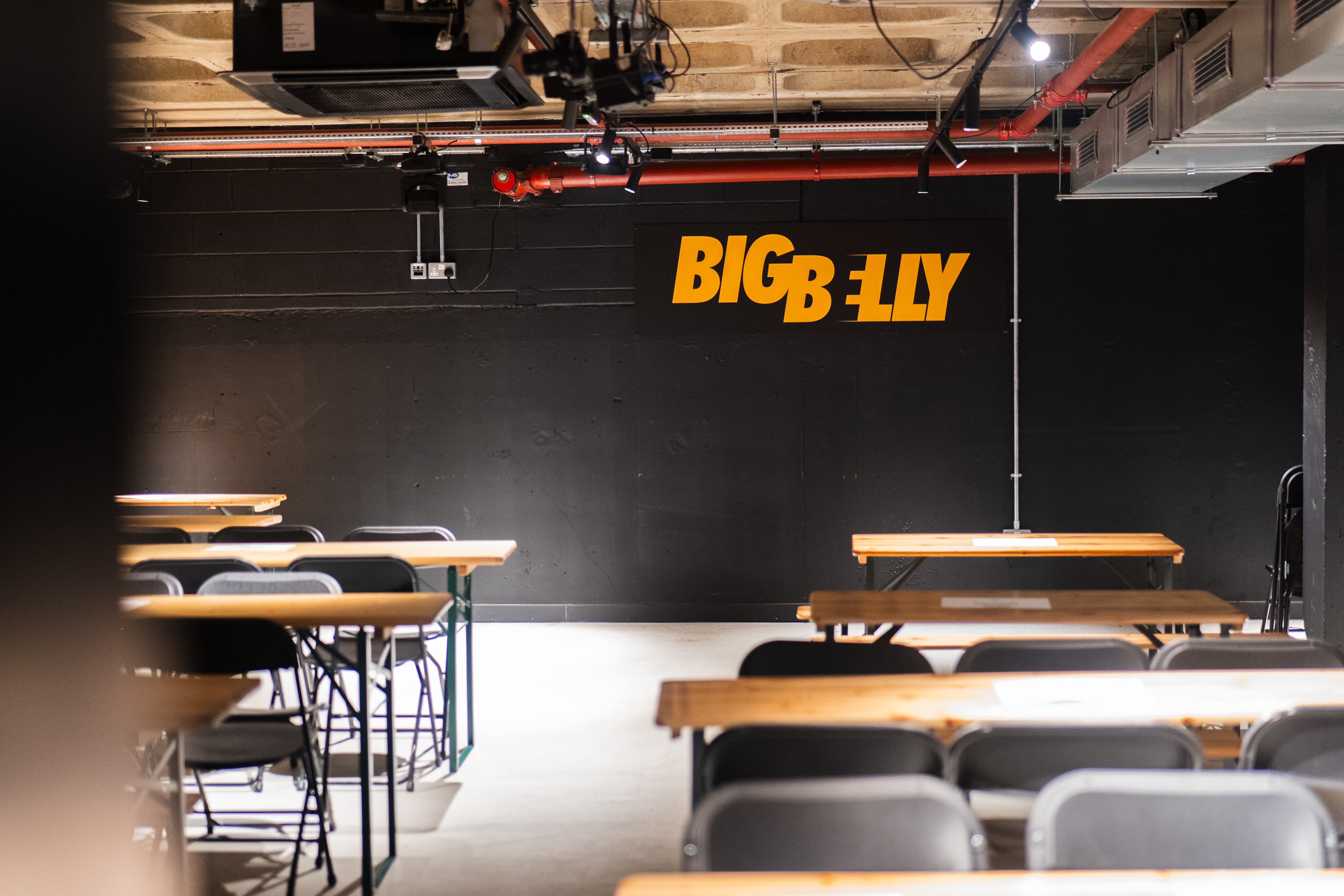 Big Belly Room: Industrial-style venue for corporate workshops and comedy events.