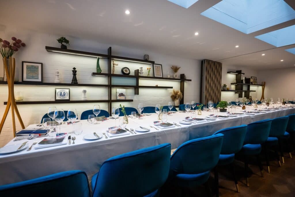 Cord Café private dining room with velvet seating for corporate dinners and executive meetings.