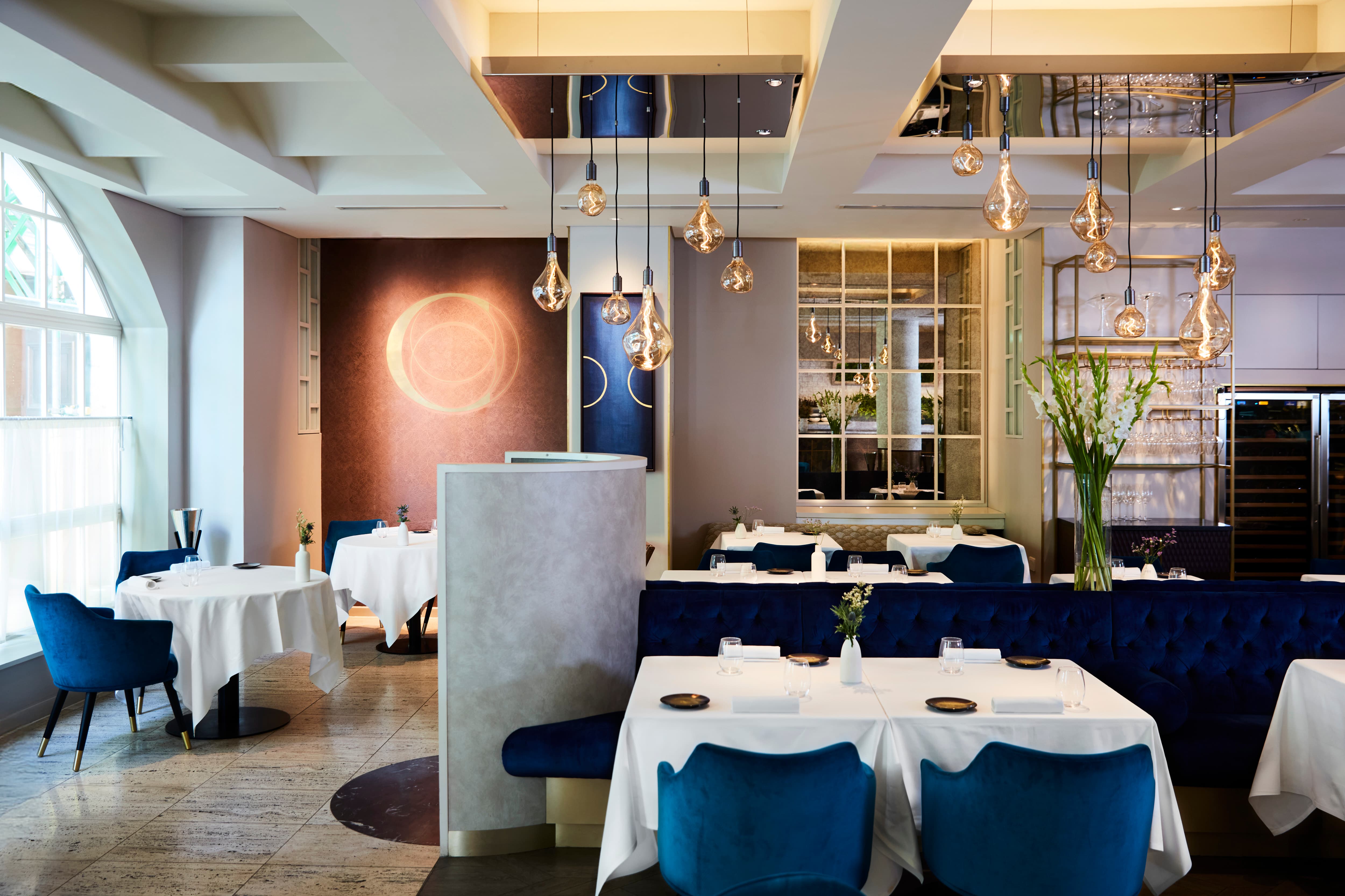 Upscale CORD Restaurant interior with plush seating for corporate dinners and networking events.