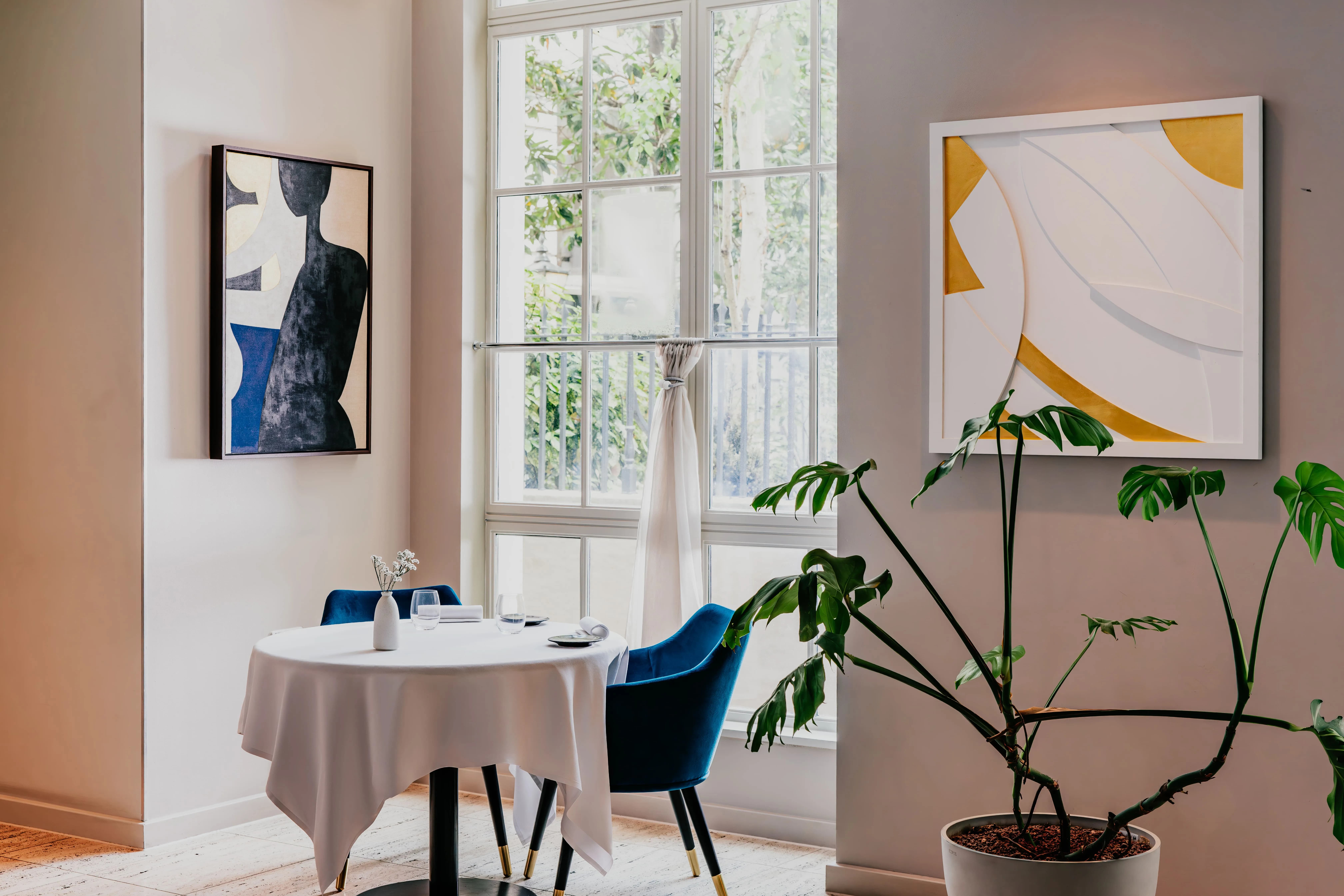 CORD Restaurant private networking space featuring sophisticated, light-filled business lunch decor.