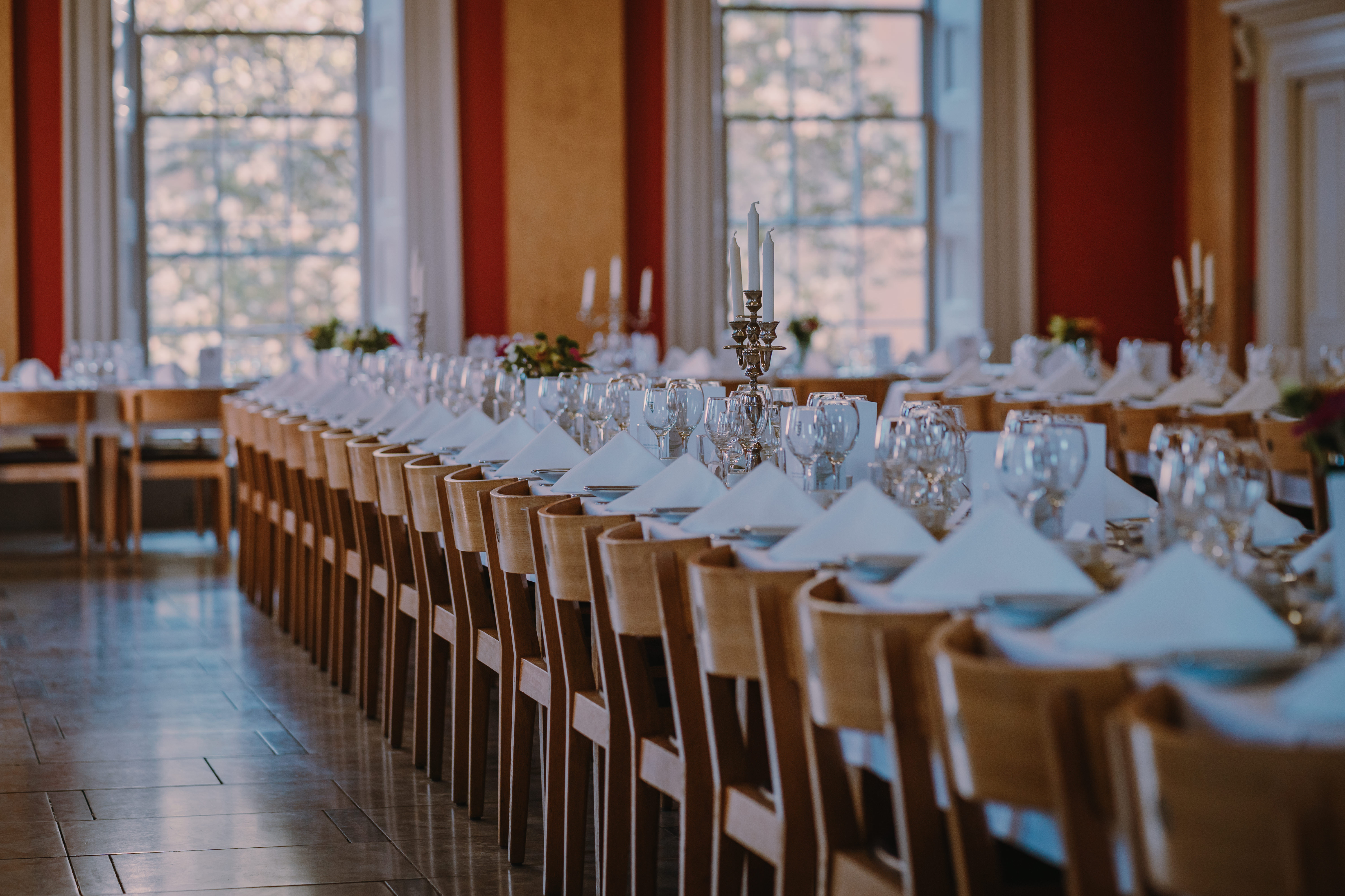 Elegant banquet setup in Downing College Hall, ideal for formal dinners and wedding receptions.