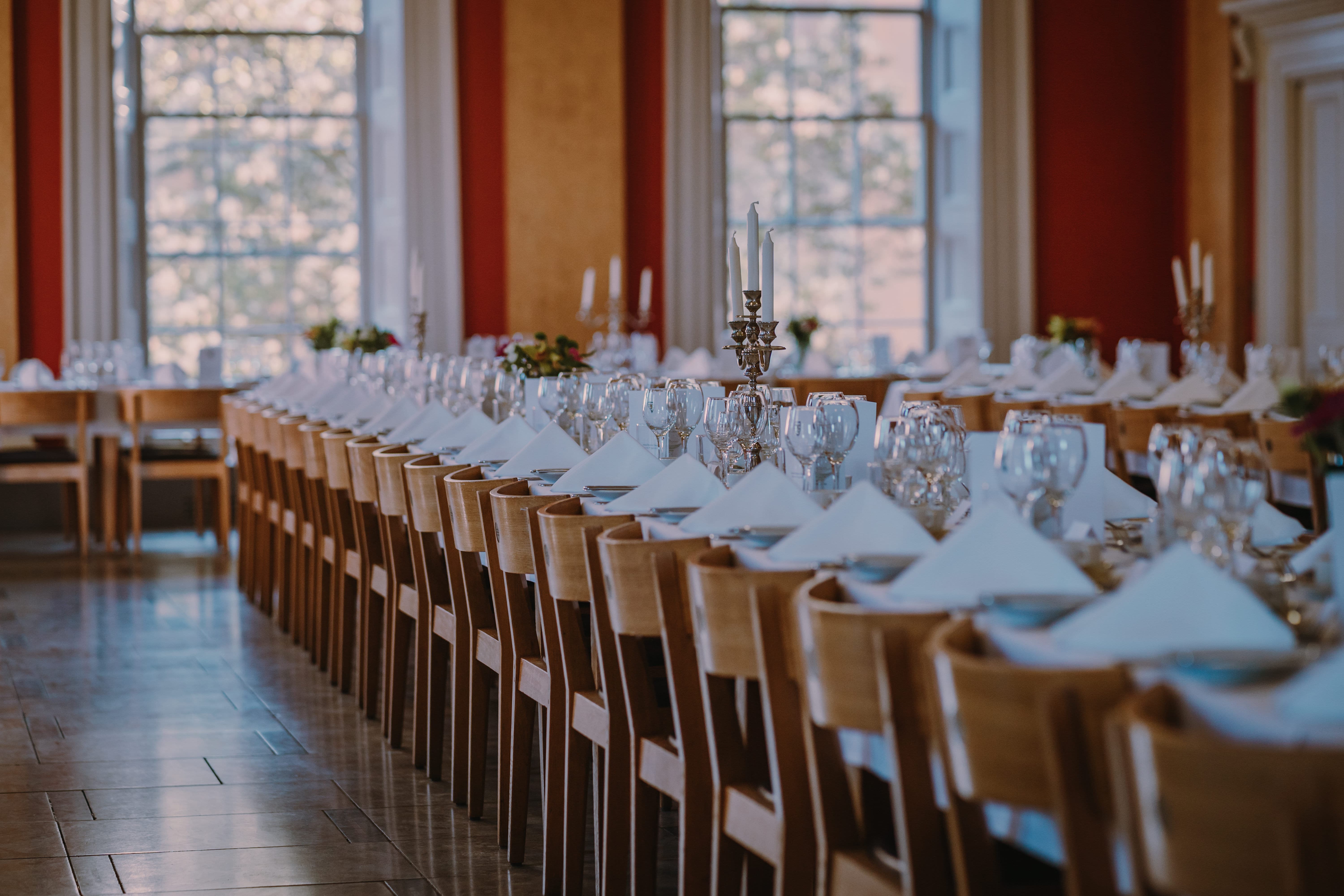College Hall banquet setup at Downing College for formal events and wedding receptions.