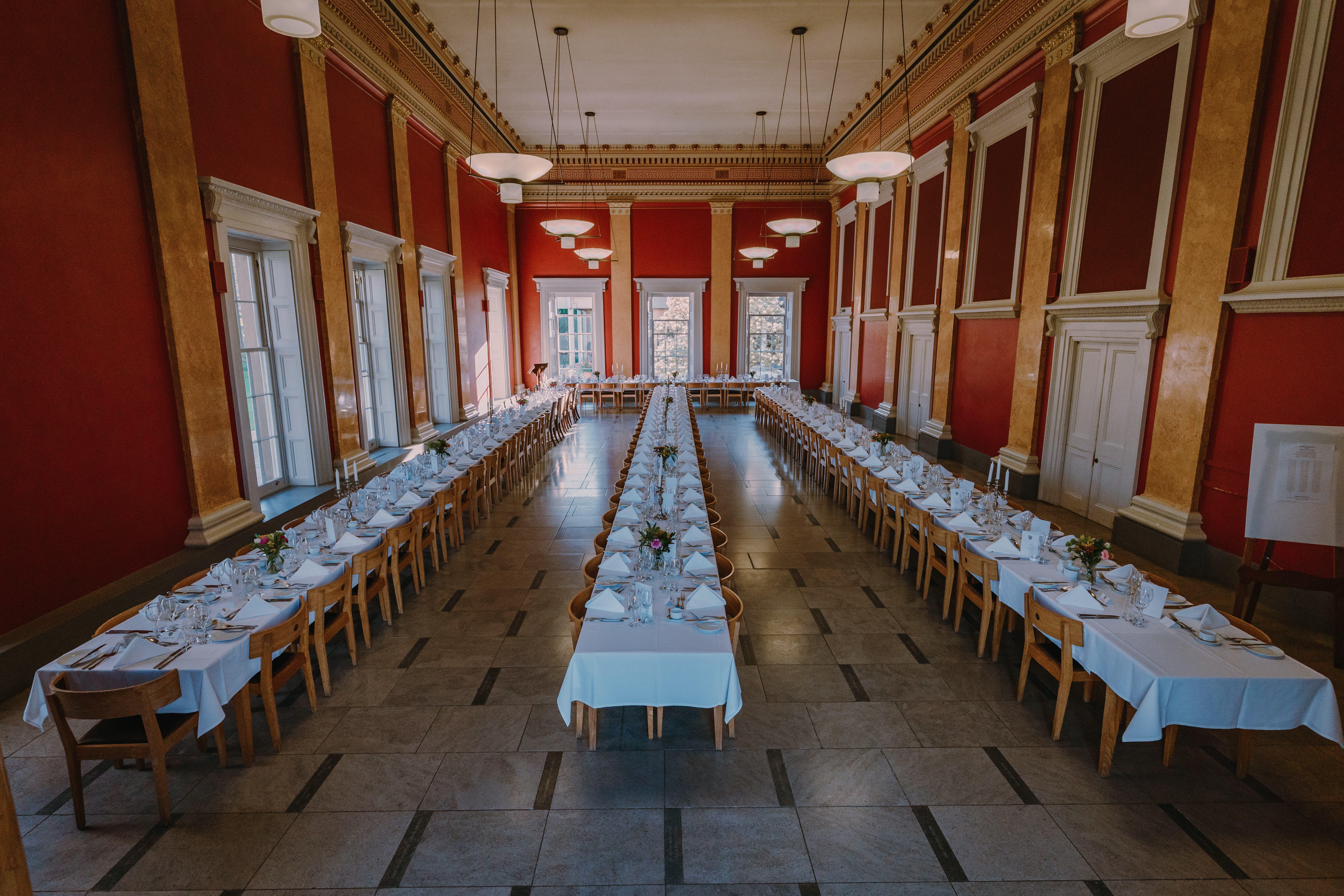 College Hall banquet setup at Downing College for formal events and high-capacity conferences.