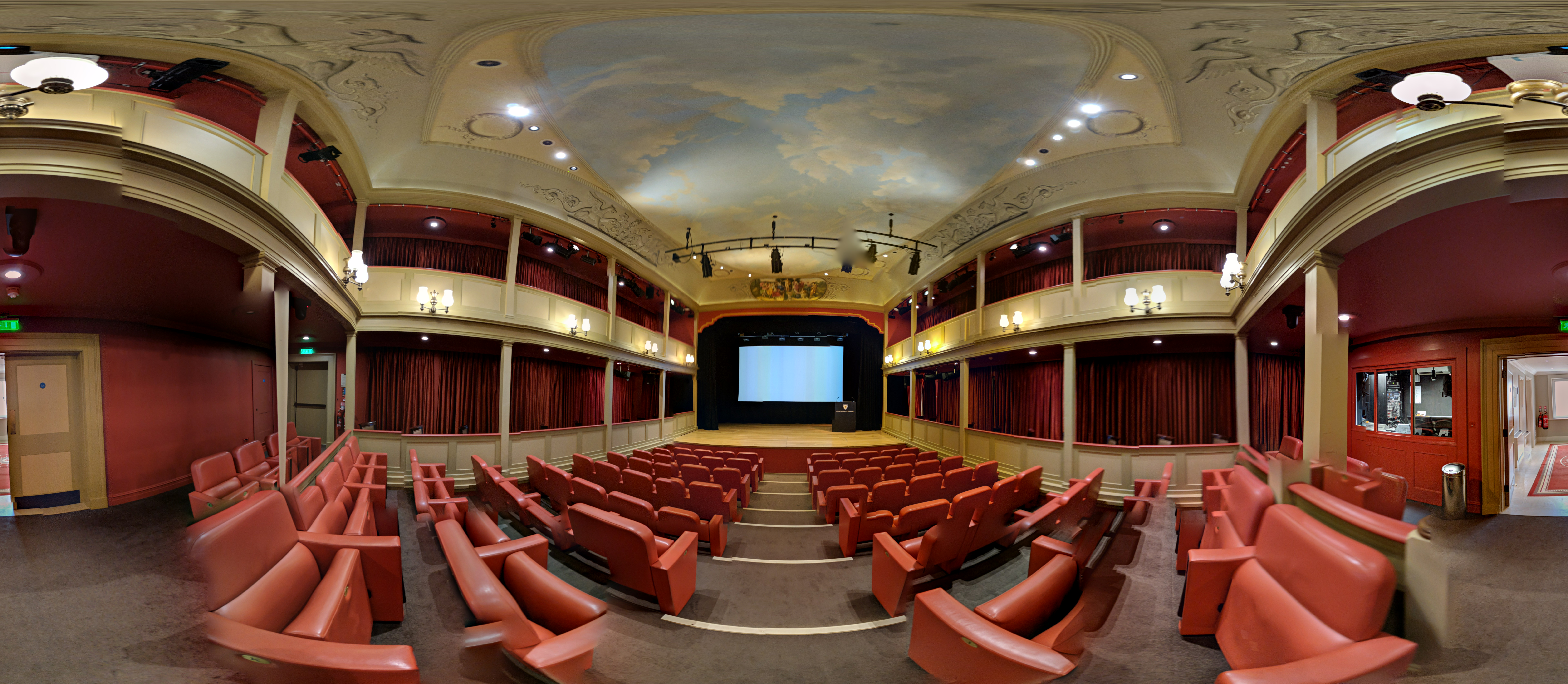 Howard Theatre tiered auditorium for corporate presentations and keynote events.