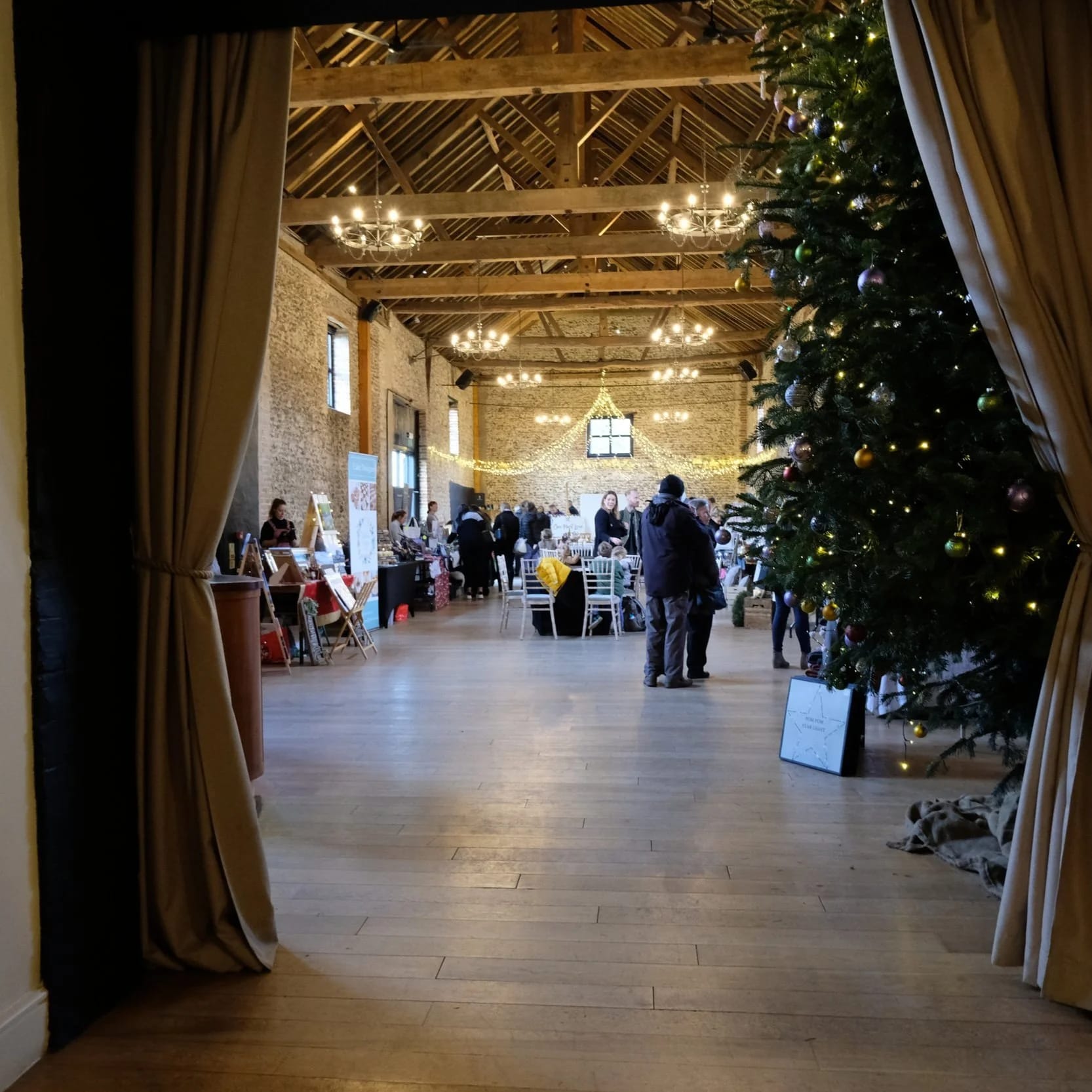 Granary Barn event space with rustic decor for seasonal trade shows and holiday pop-up markets.