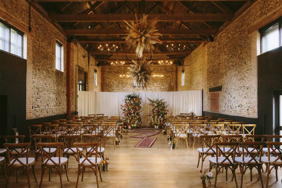Rustic Granary Barn with exposed brick for intimate wedding and event venue ceremonies.