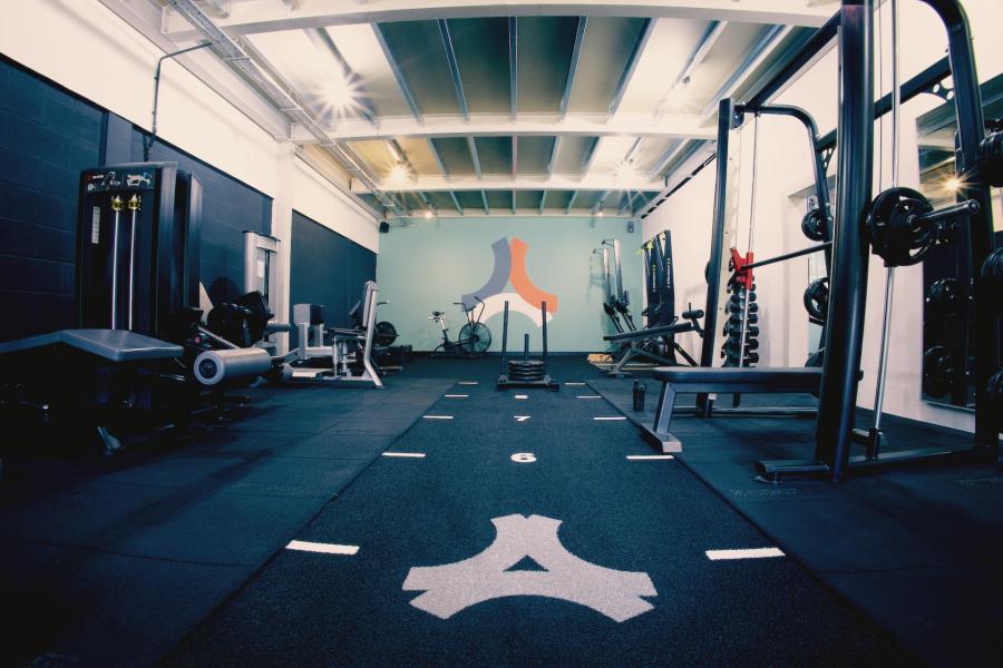 CrossFit Ancoats industrial training floor for corporate wellness and team-building events.