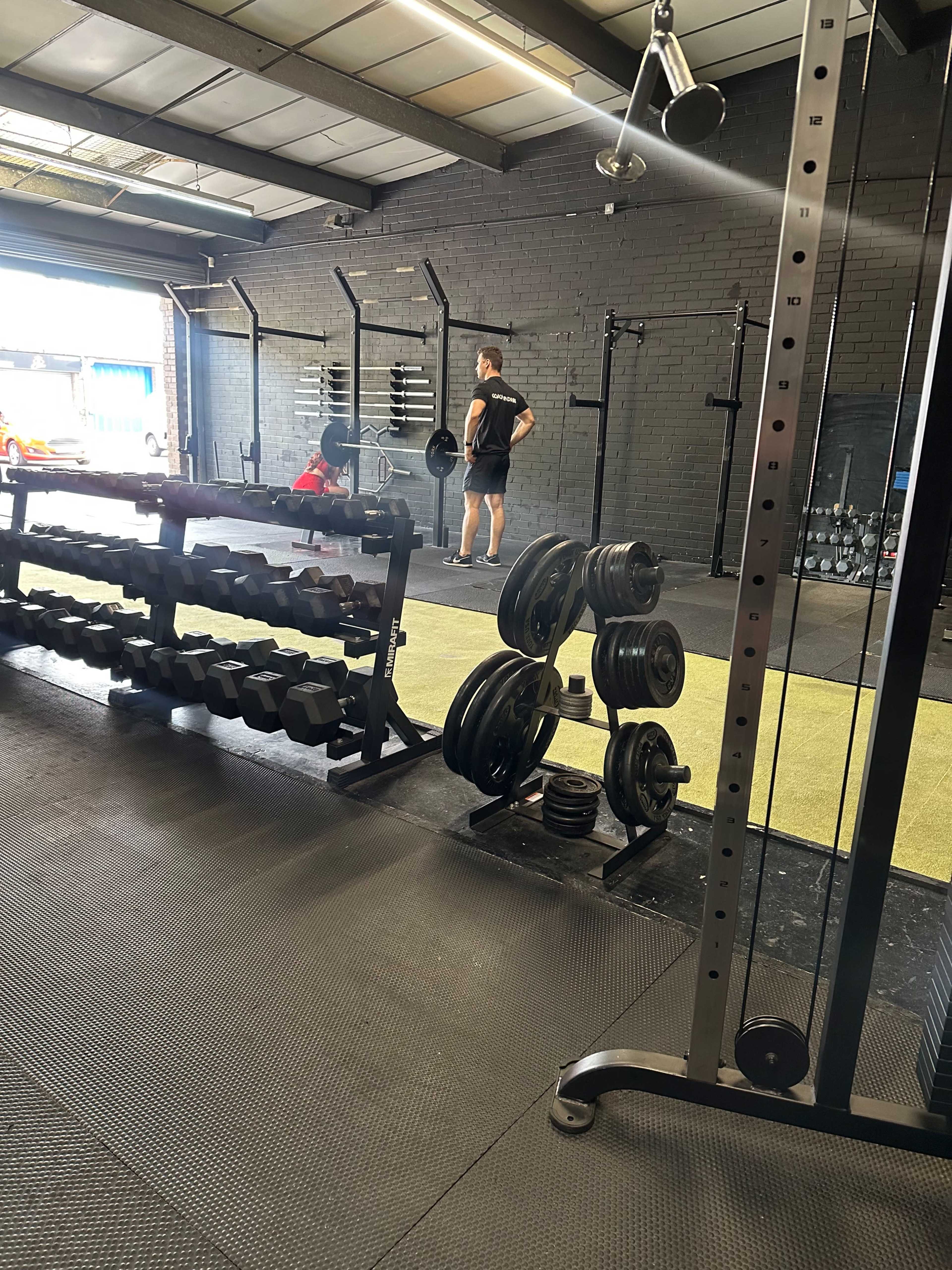CrossFit Ancoats main training floor, industrial gym space for corporate team building events.