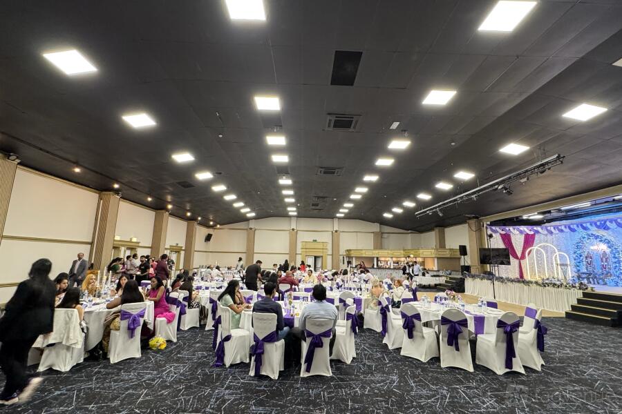 Terminal Suite banquet hall with tiered lighting, ideal for corporate conferences and gala events.