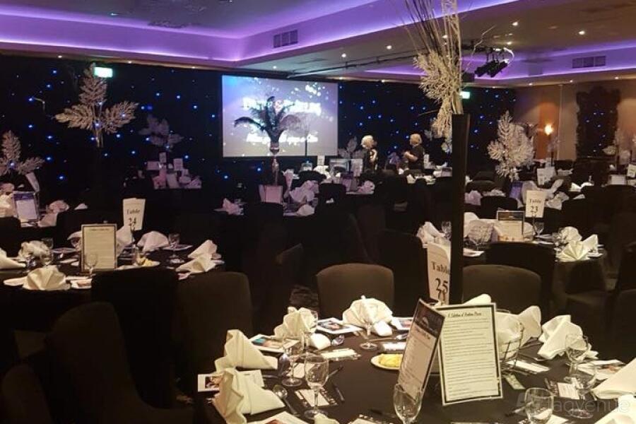 Concorde Suite gala dinner setup with starcloth draping for high-end corporate event planning.