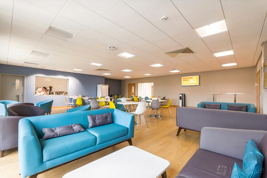 Saunders Room at LOROS Centre: Flexible lounge space for corporate networking and event registration.